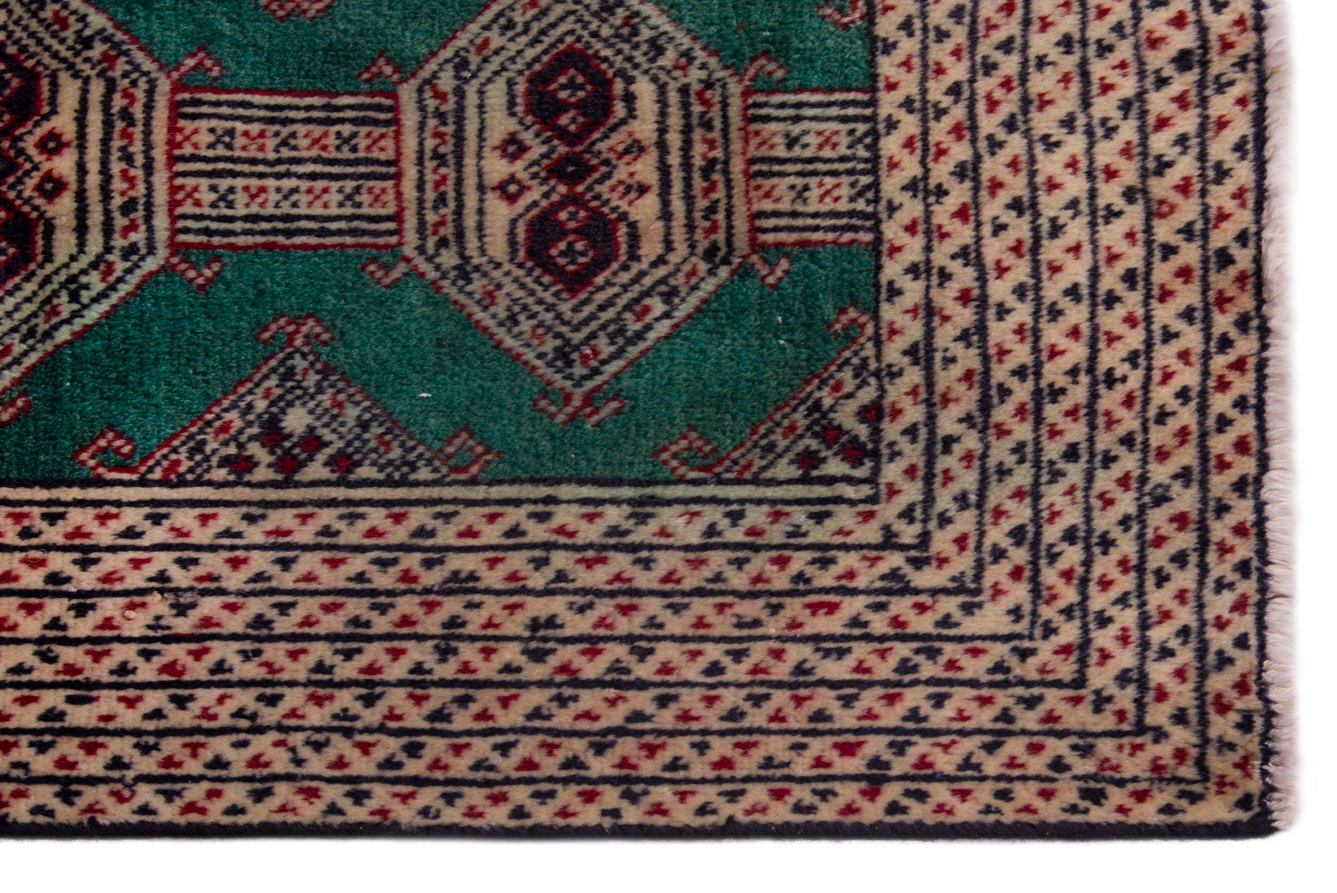 Persian Torkaman accent rug in rust and teal, view 4 of 7
