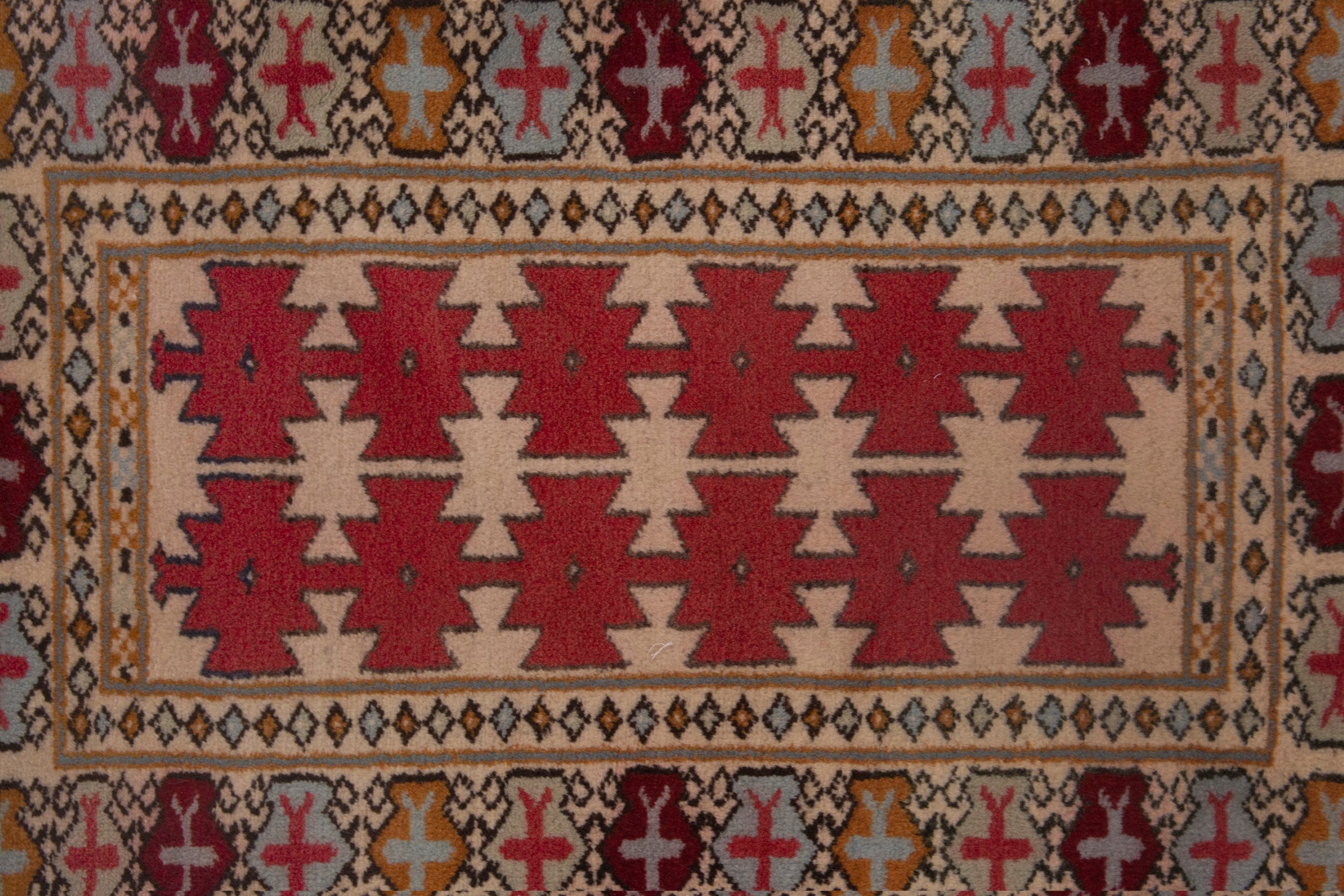 Persian Torkaman accent rug in cream and deep red, view 6 of 7
