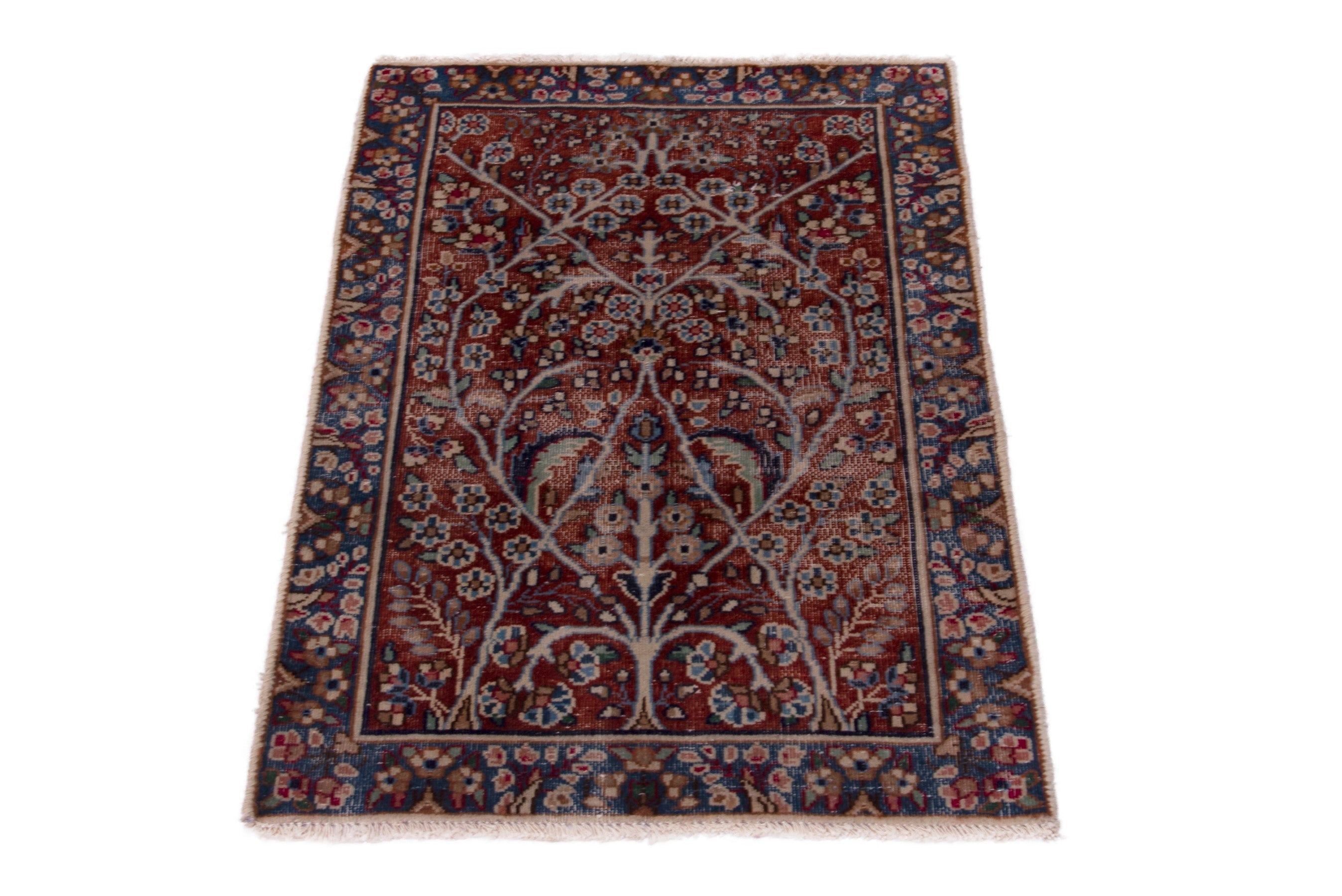 Persian Kerman accent rug in deep red and navy, view 3 of 7