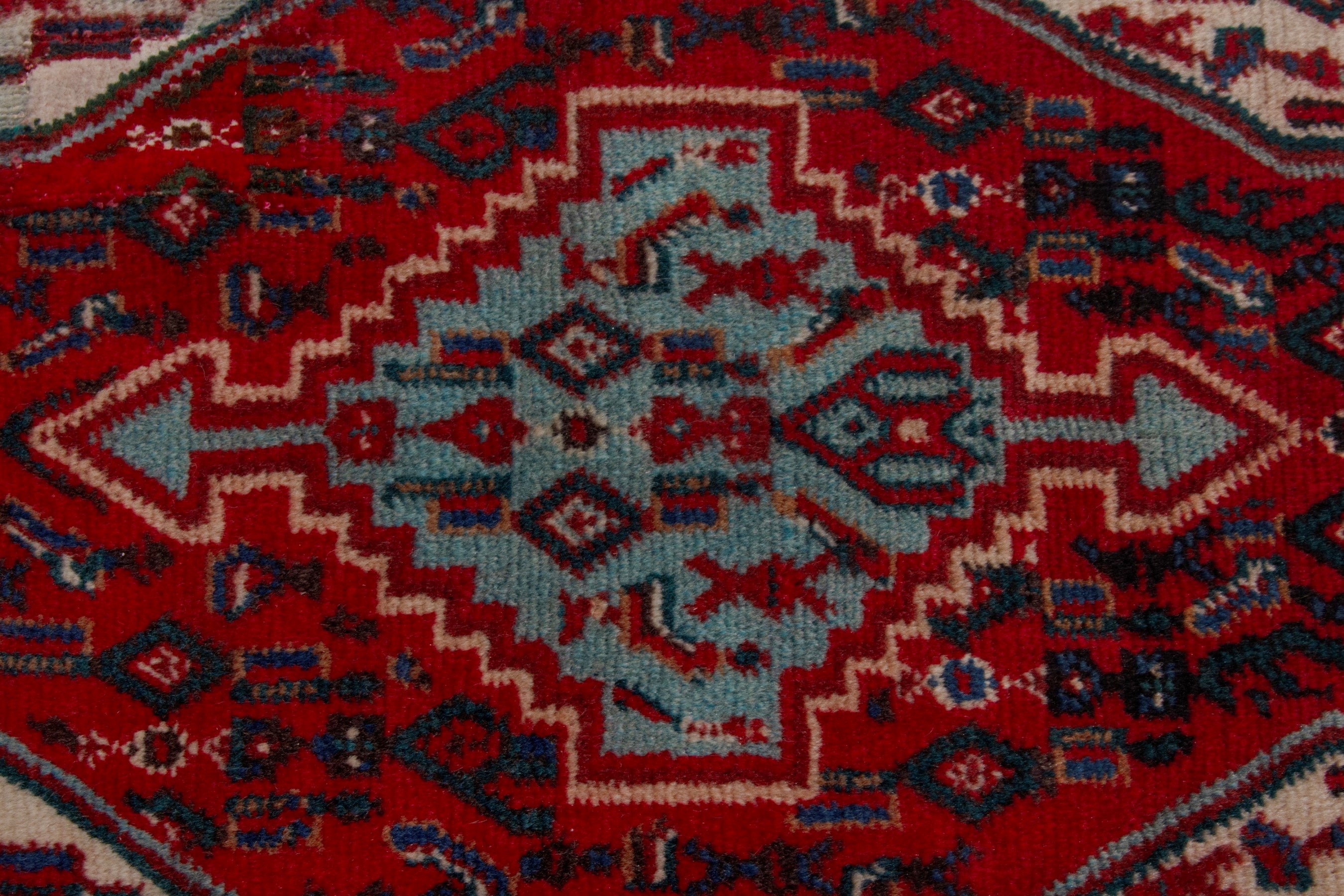 Persian Sanandaj accent rug in deep red and muted pink, view 6 of 7