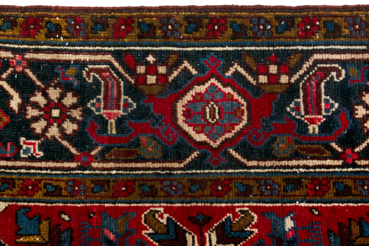 Turkish Anatolian area rug in deep red and navy, view 17 of 21