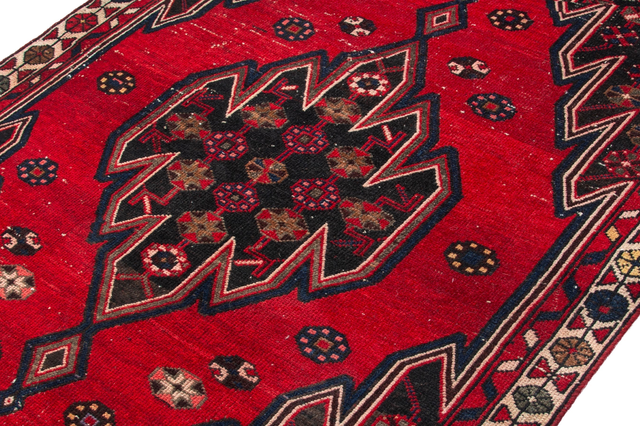 Persian Saveh accent rug in deep red and dark brown, view 8 of 19