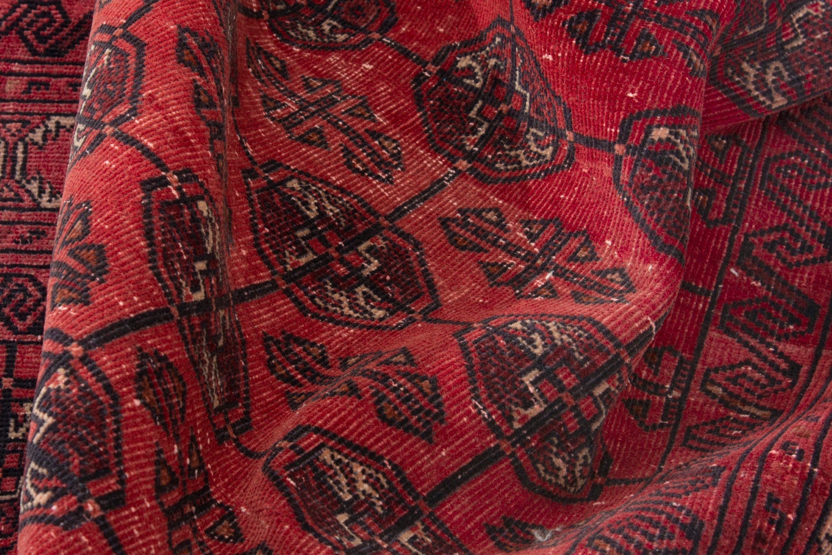 Persian Torkaman accent rug in deep red and burgundy, view 15 of 17