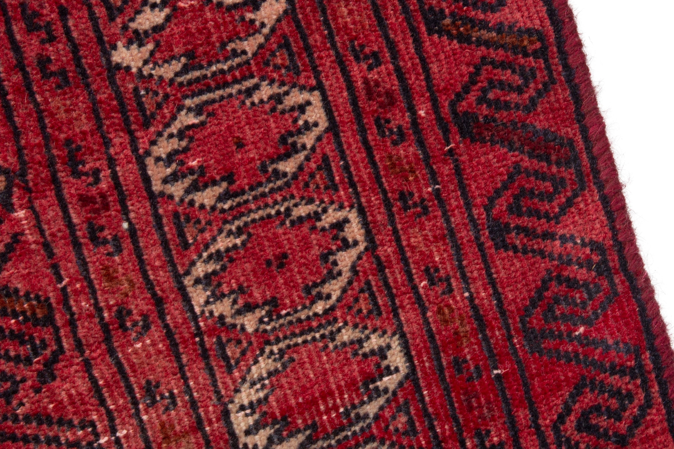 Persian Torkaman accent rug in deep red and burgundy, view 9 of 17