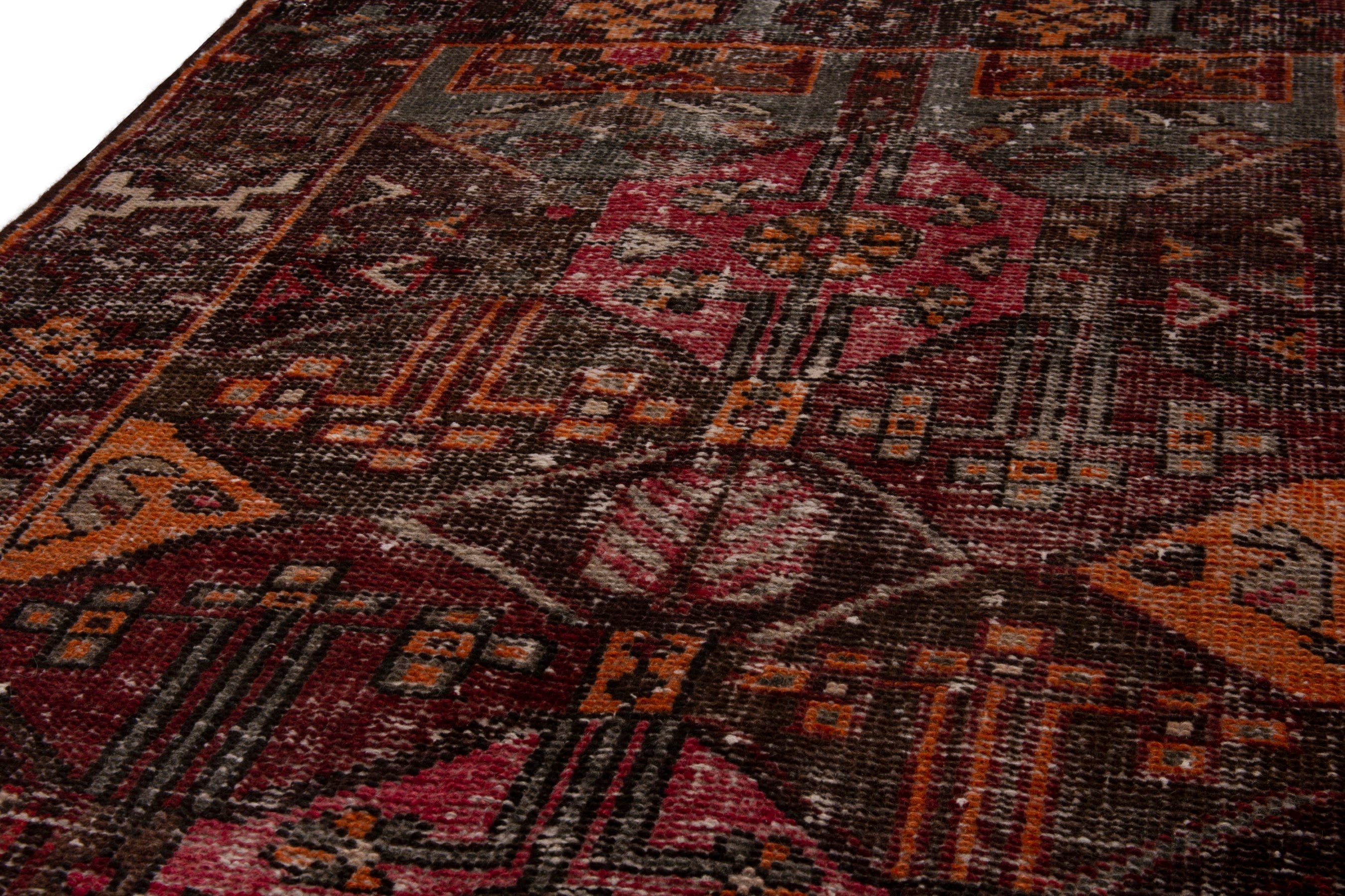 Persian Bakhtiari accent rug in burgundy and rust, view 6 of 20