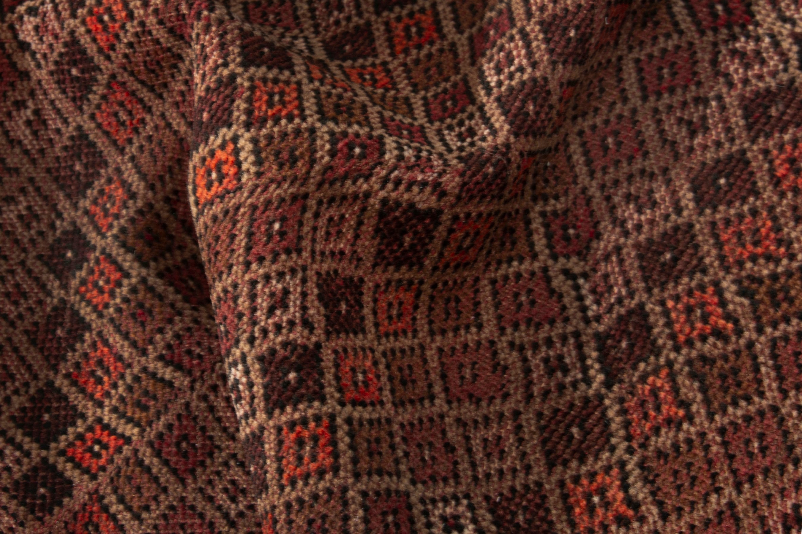 Persian Baluch accent rug in tan and rust, view 16 of 17