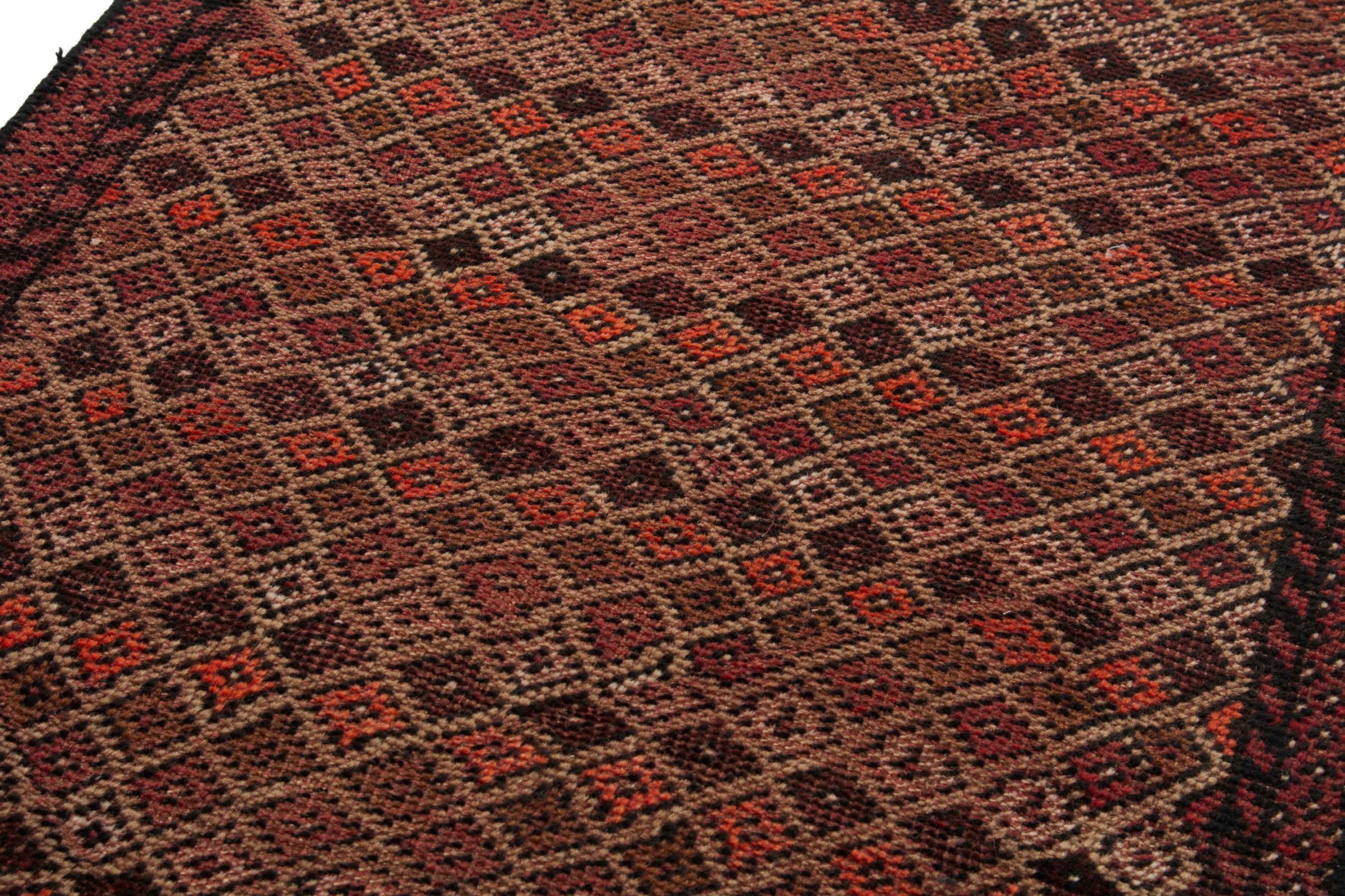 Persian Baluch accent rug in tan and rust, view 6 of 17