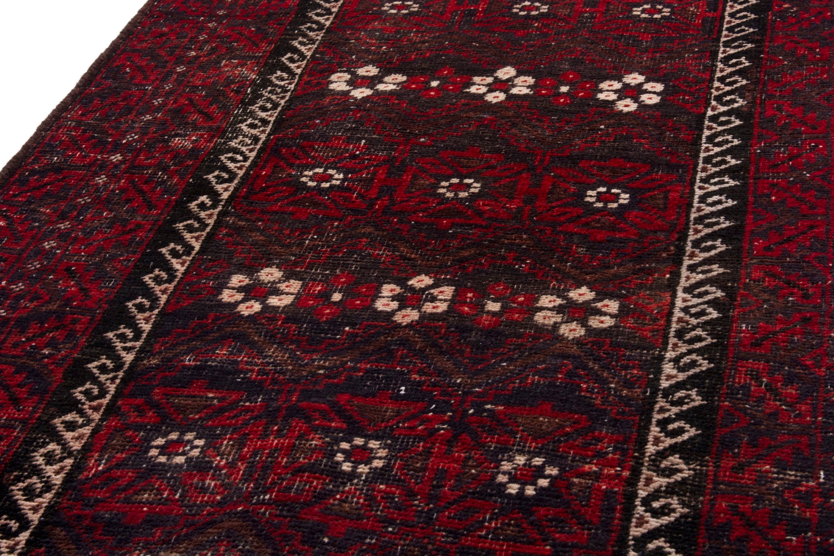 Persian Baluch runner rug in burgundy and deep red, view 6 of 17
