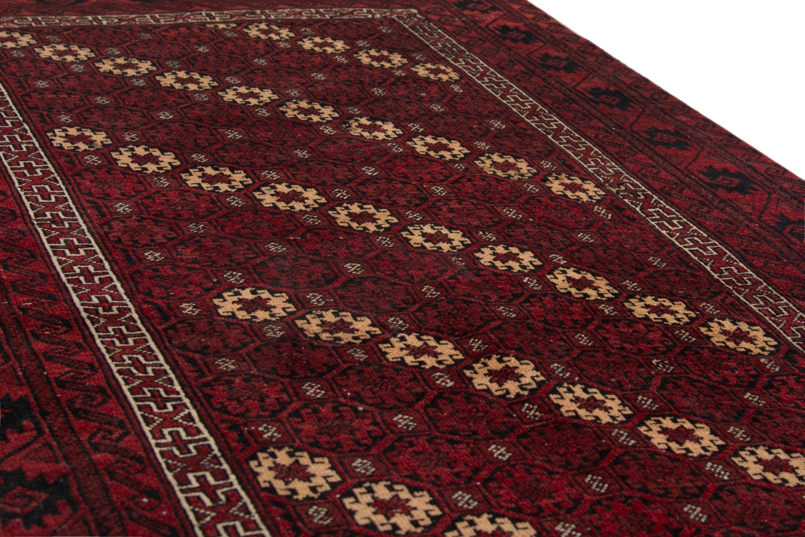 Persian Baluch accent rug in burgundy and deep red, view 6 of 17