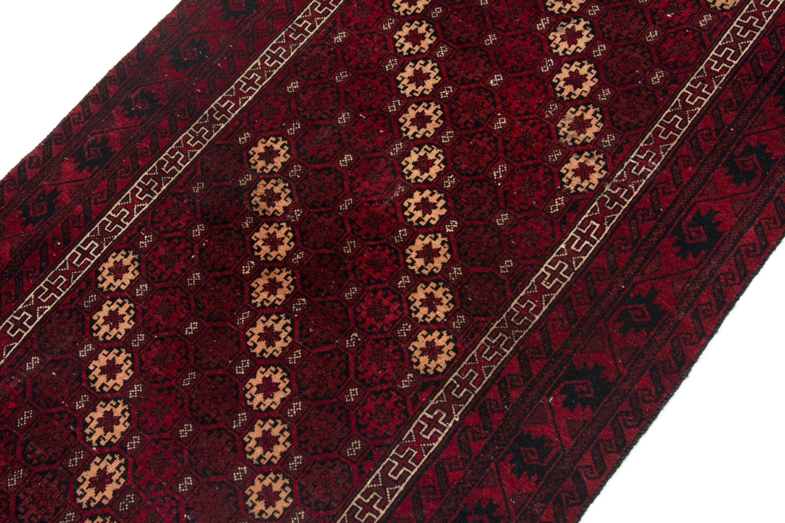 Persian Baluch accent rug in burgundy and deep red, view 7 of 17