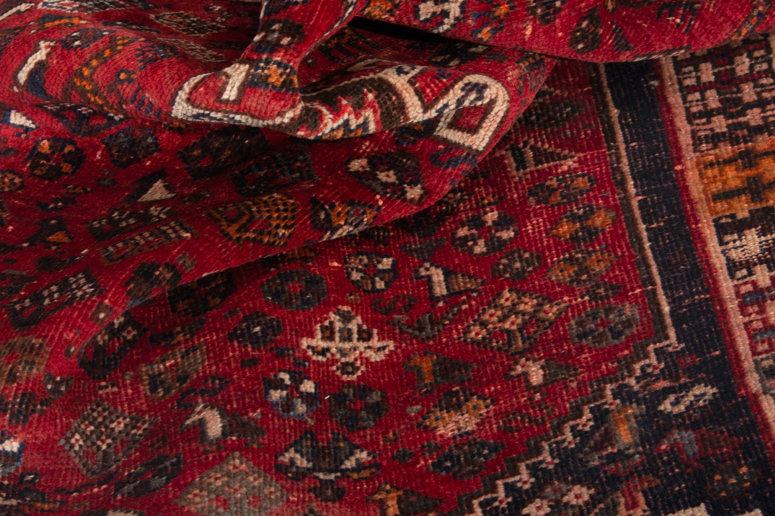 Persian Shiraz accent rug in deep red and navy, view 16 of 18