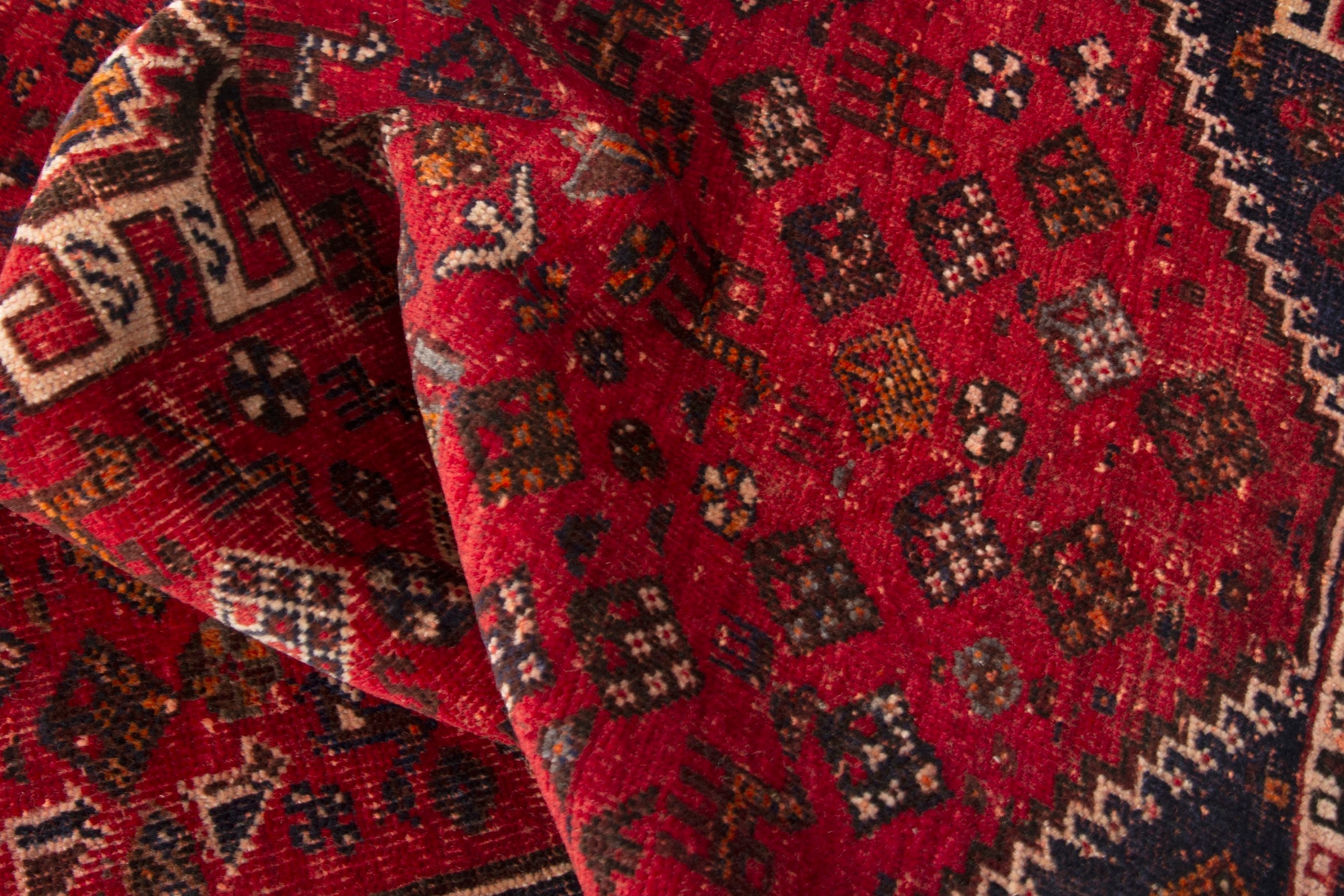 Persian Shiraz accent rug in deep red and navy, view 17 of 18
