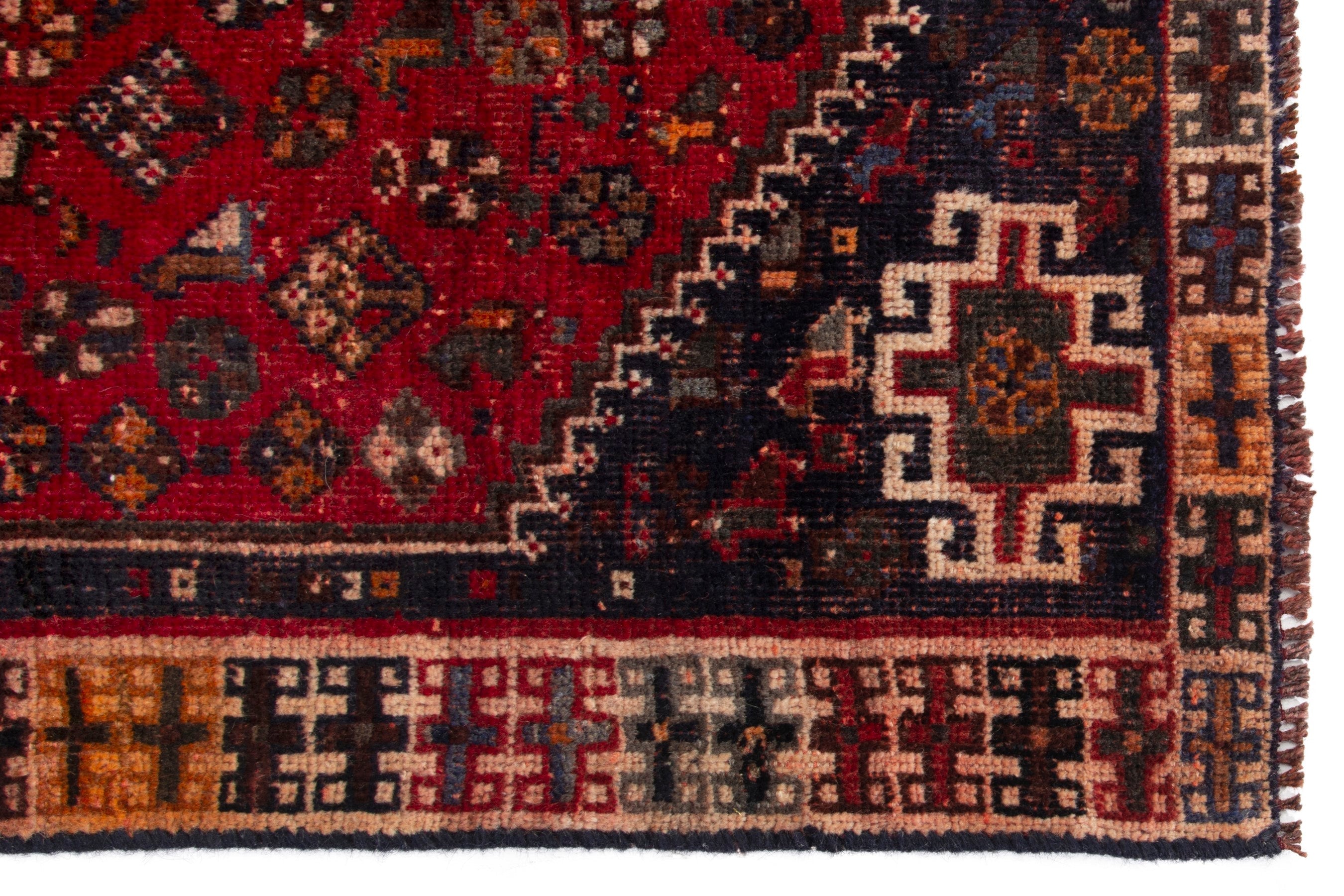 Persian Shiraz accent rug in deep red and navy, view 9 of 18