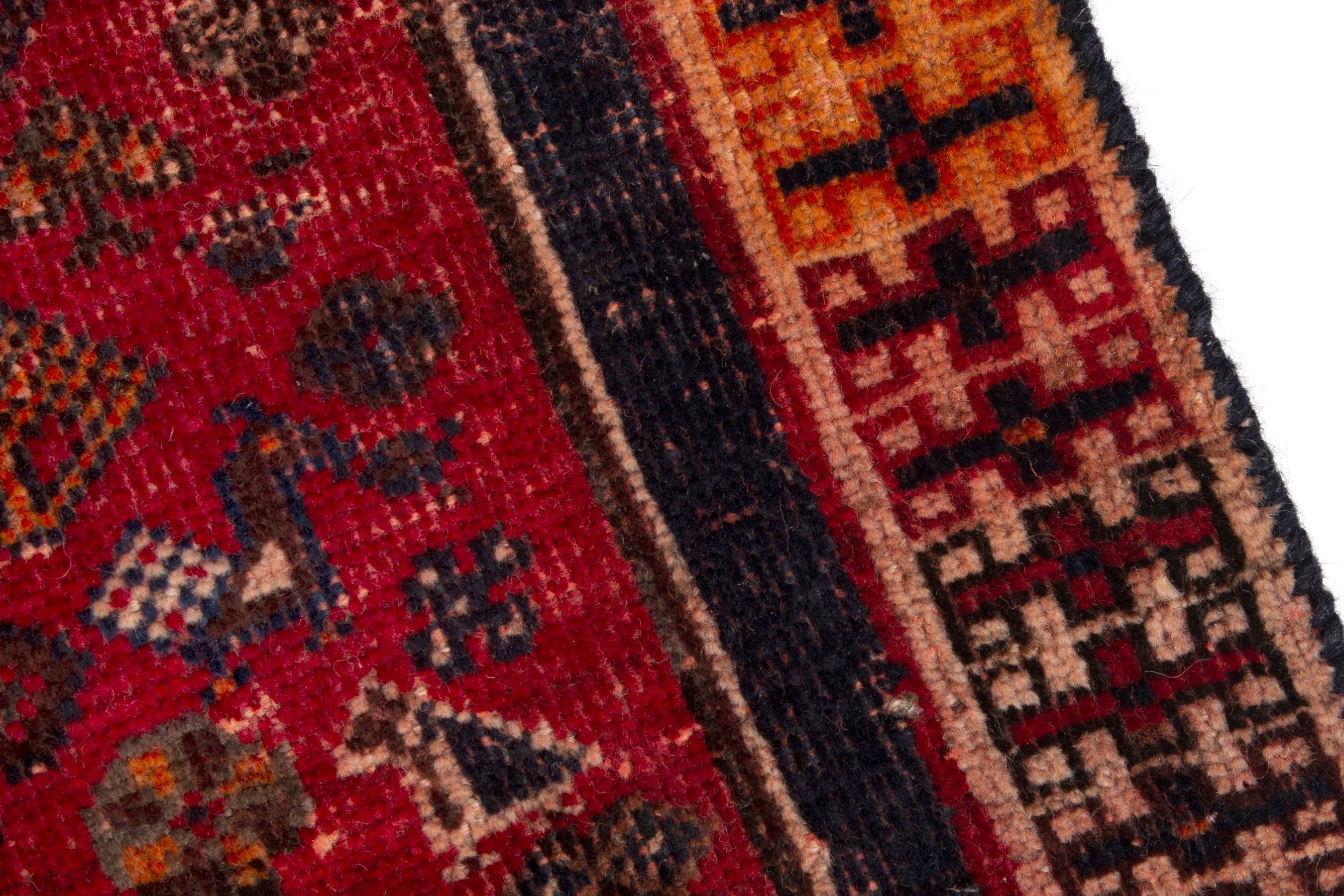 Persian Shiraz accent rug in deep red and navy, view 10 of 18