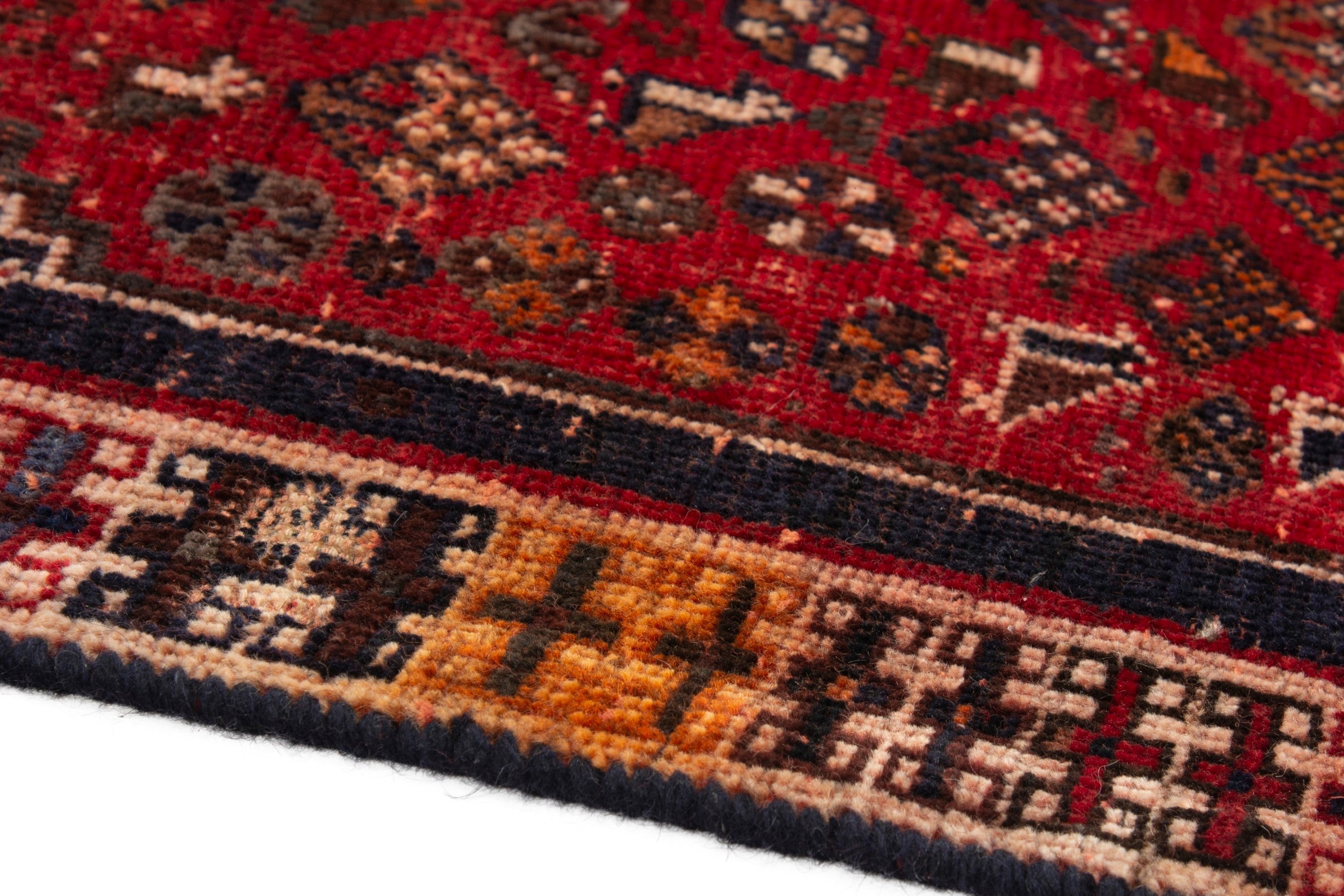 Persian Shiraz accent rug in deep red and navy, view 5 of 18