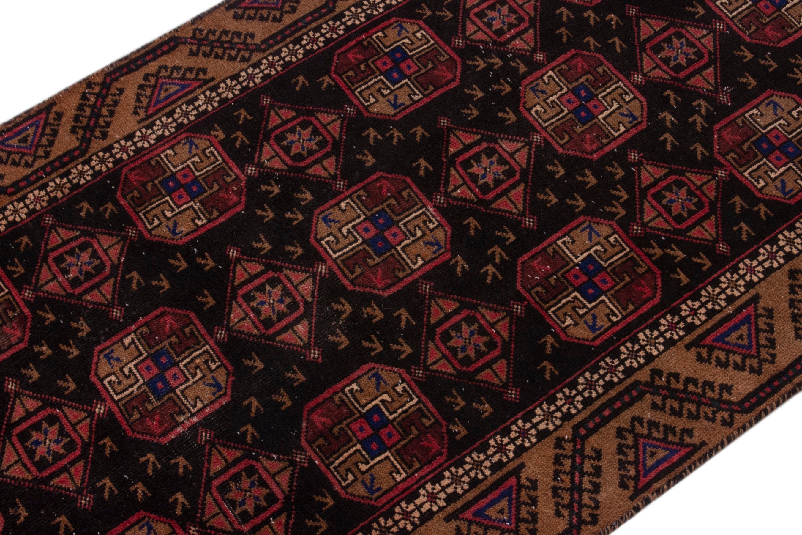 Persian Torkaman runner rug in navy and rust, view 6 of 19