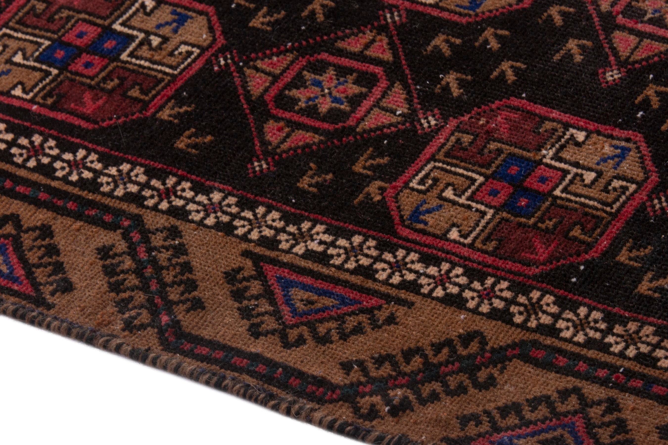 Persian Torkaman runner rug in navy and rust, view 5 of 19