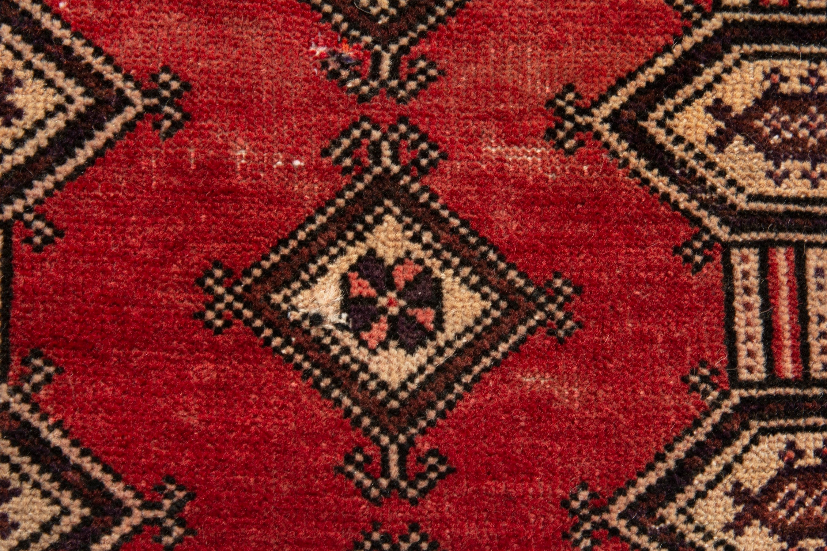 Persian Baluch accent rug in deep red and cream, view 9 of 16