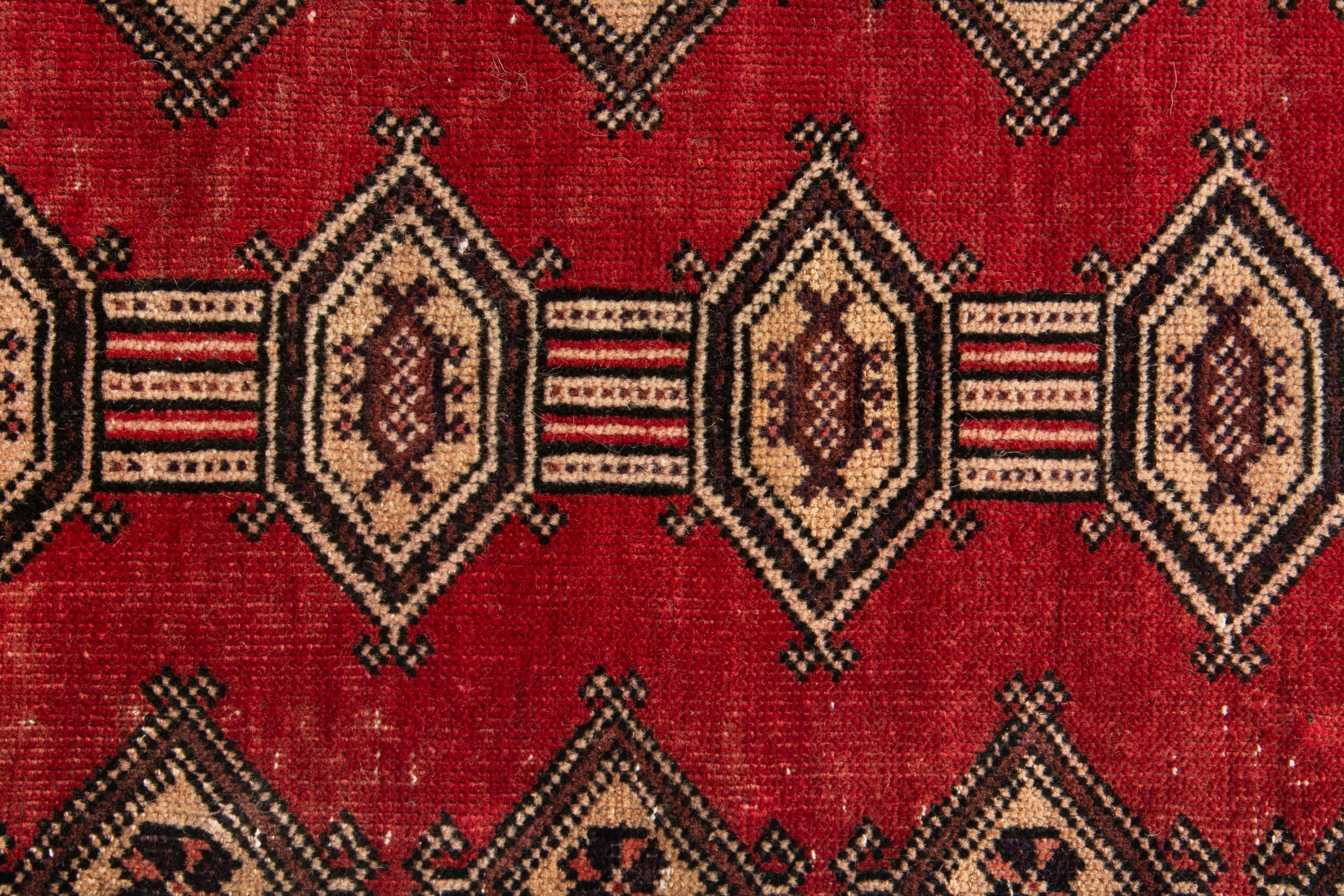 Persian Baluch accent rug in deep red and cream, view 11 of 16