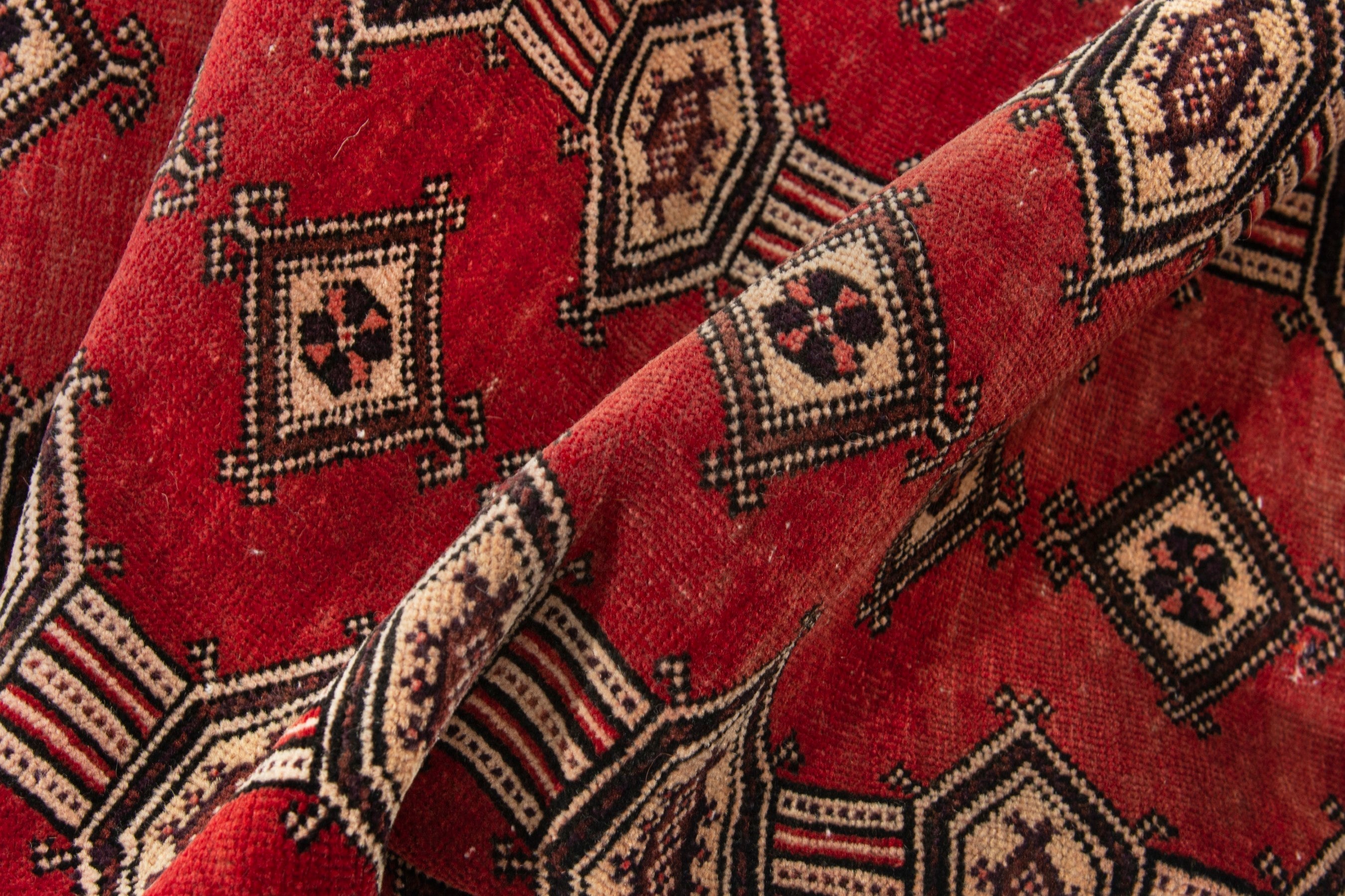 Persian Baluch accent rug in deep red and cream, view 14 of 16