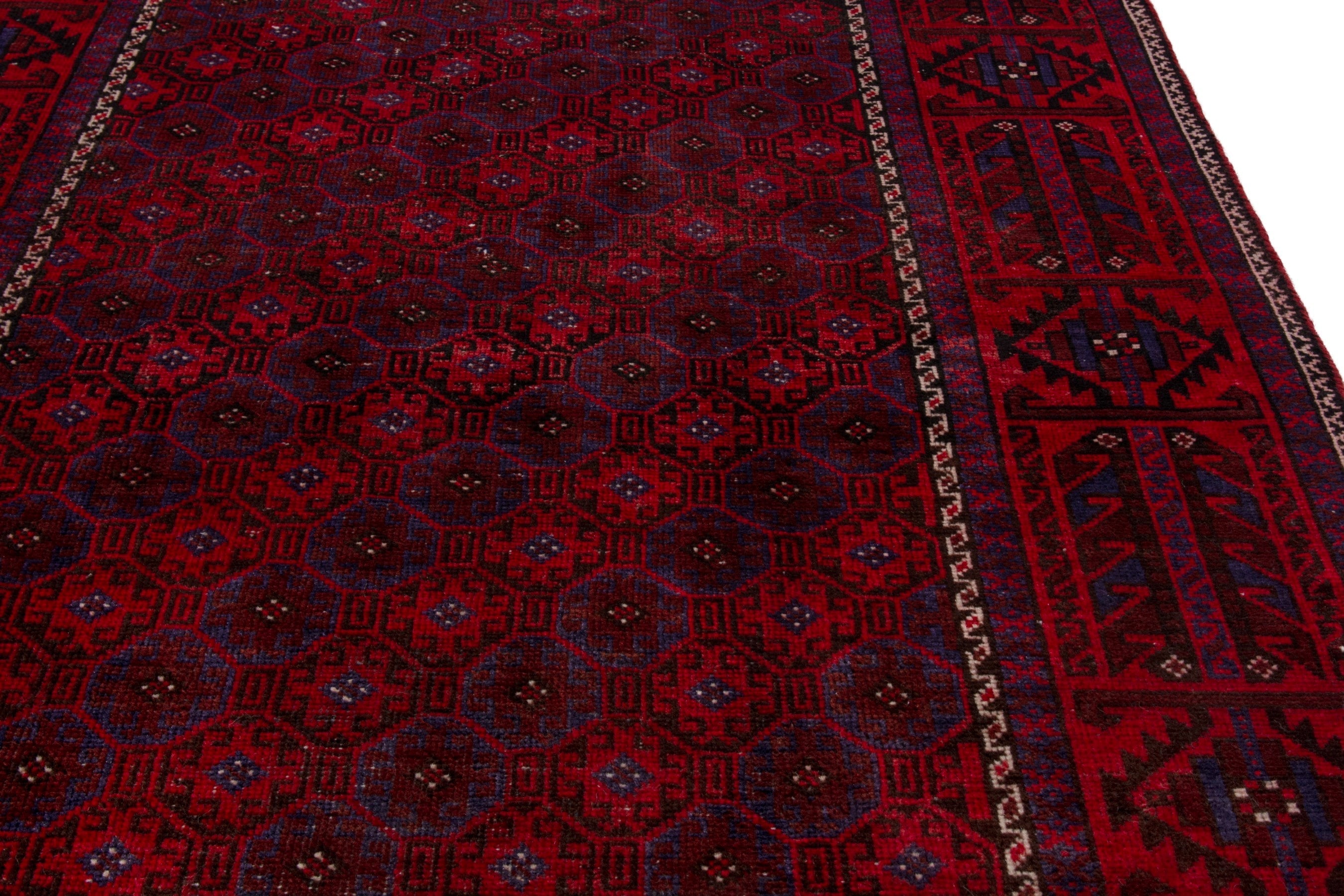 Persian Baluch accent rug in deep red and burgundy, view 7 of 20