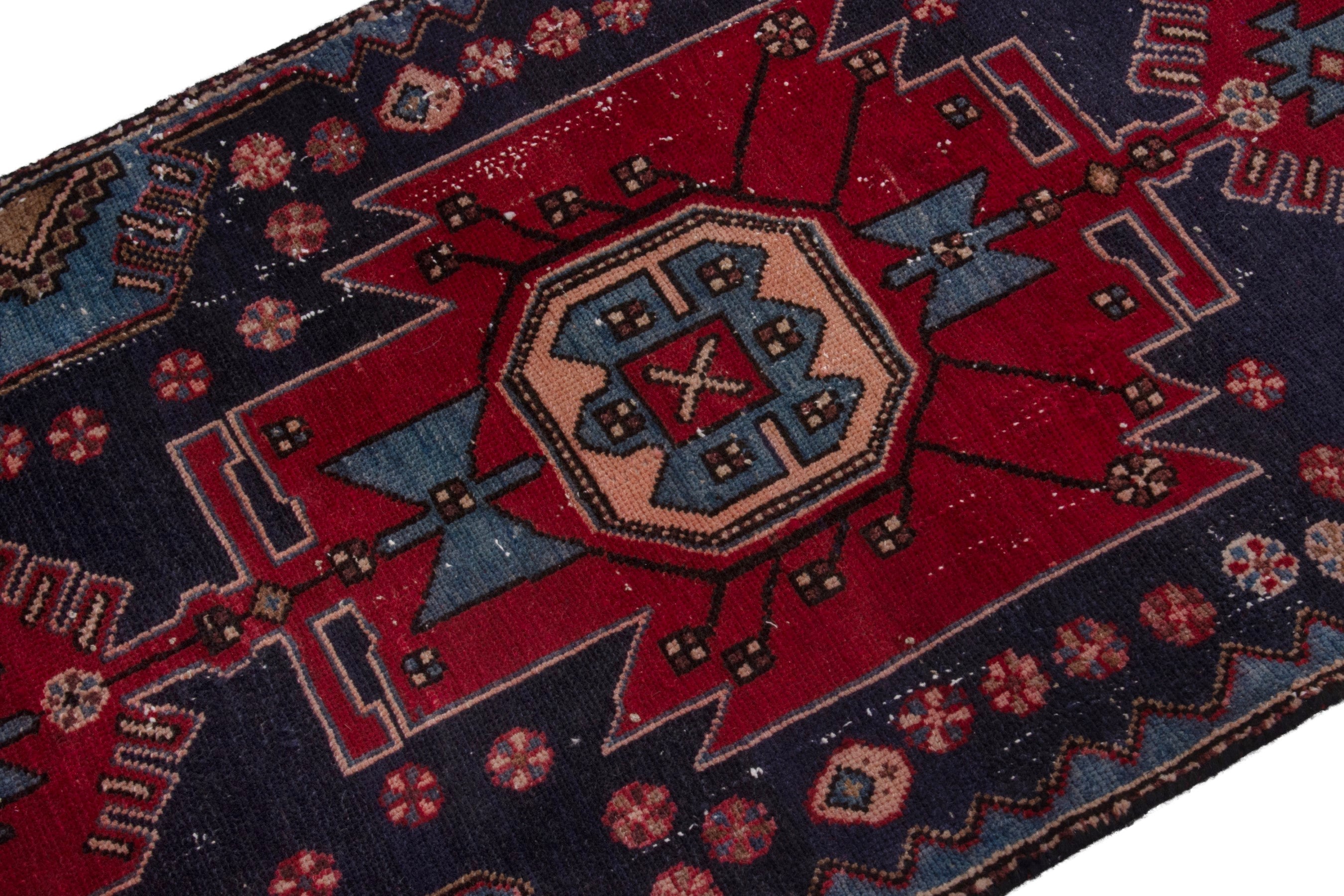 Persian Zanjan accent rug in deep red and dark blue, view 6 of 17