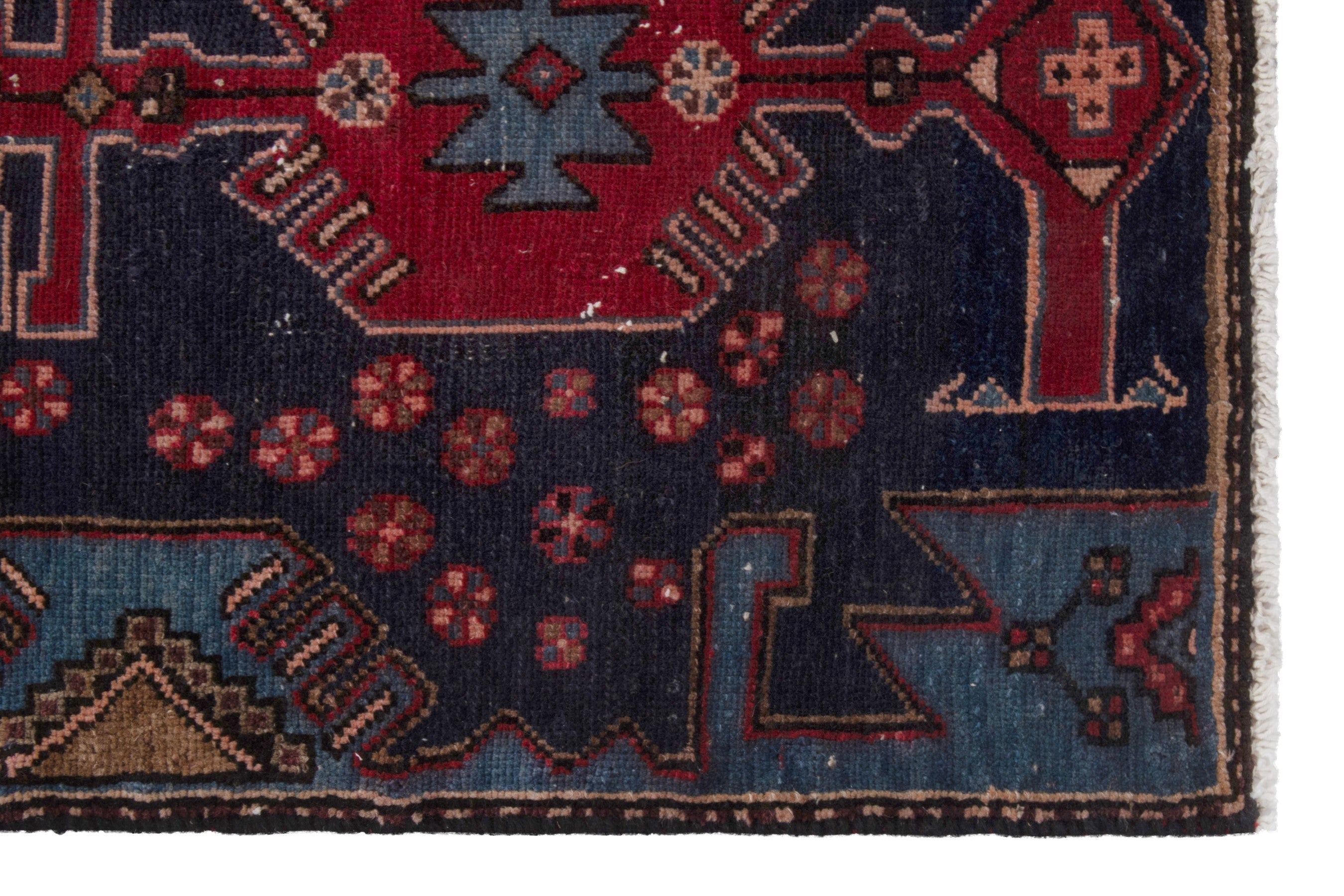 Persian Zanjan accent rug in deep red and dark blue, view 9 of 17