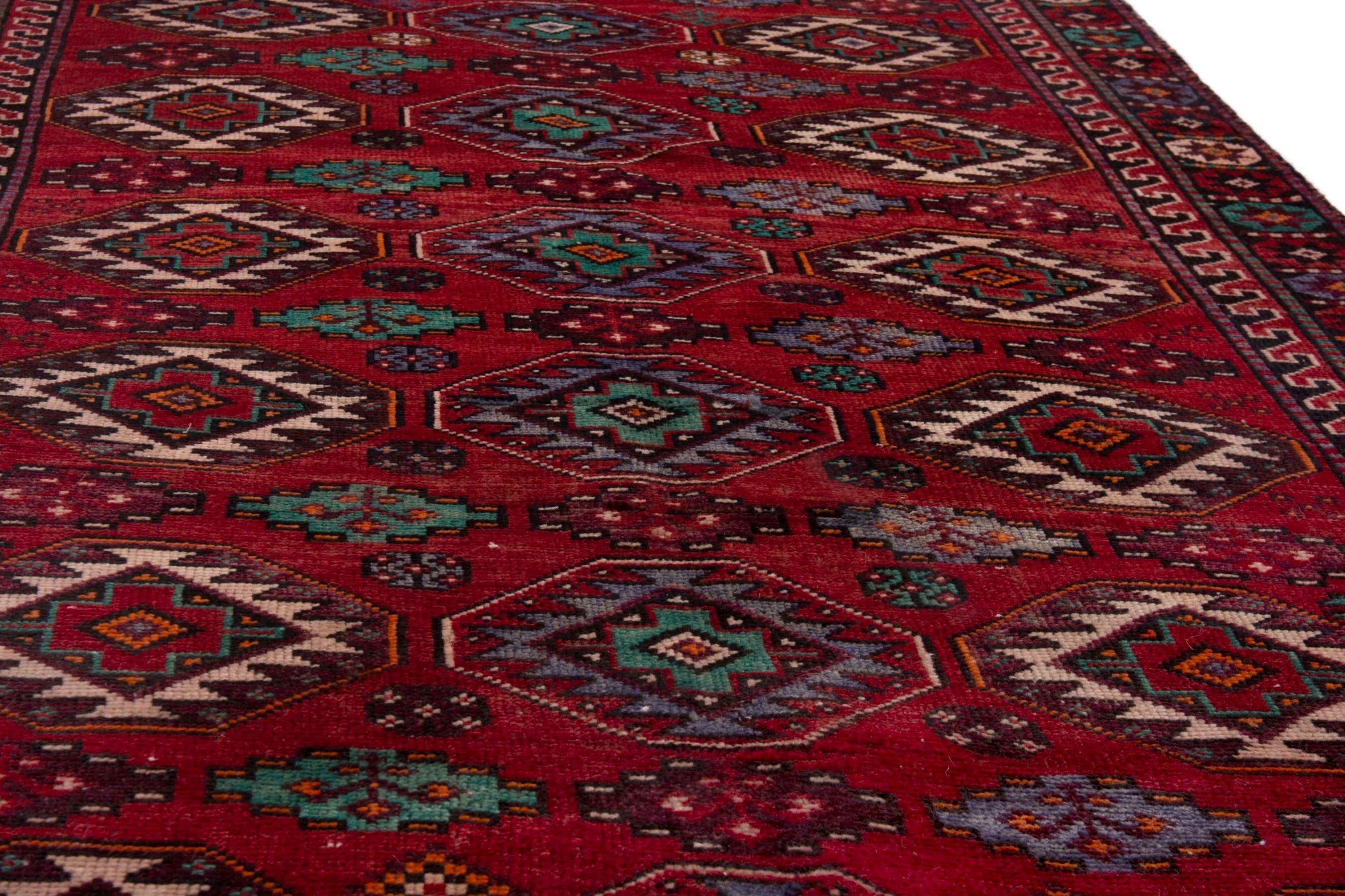 Persian Baluch area rug in deep red and burgundy, view 8 of 18