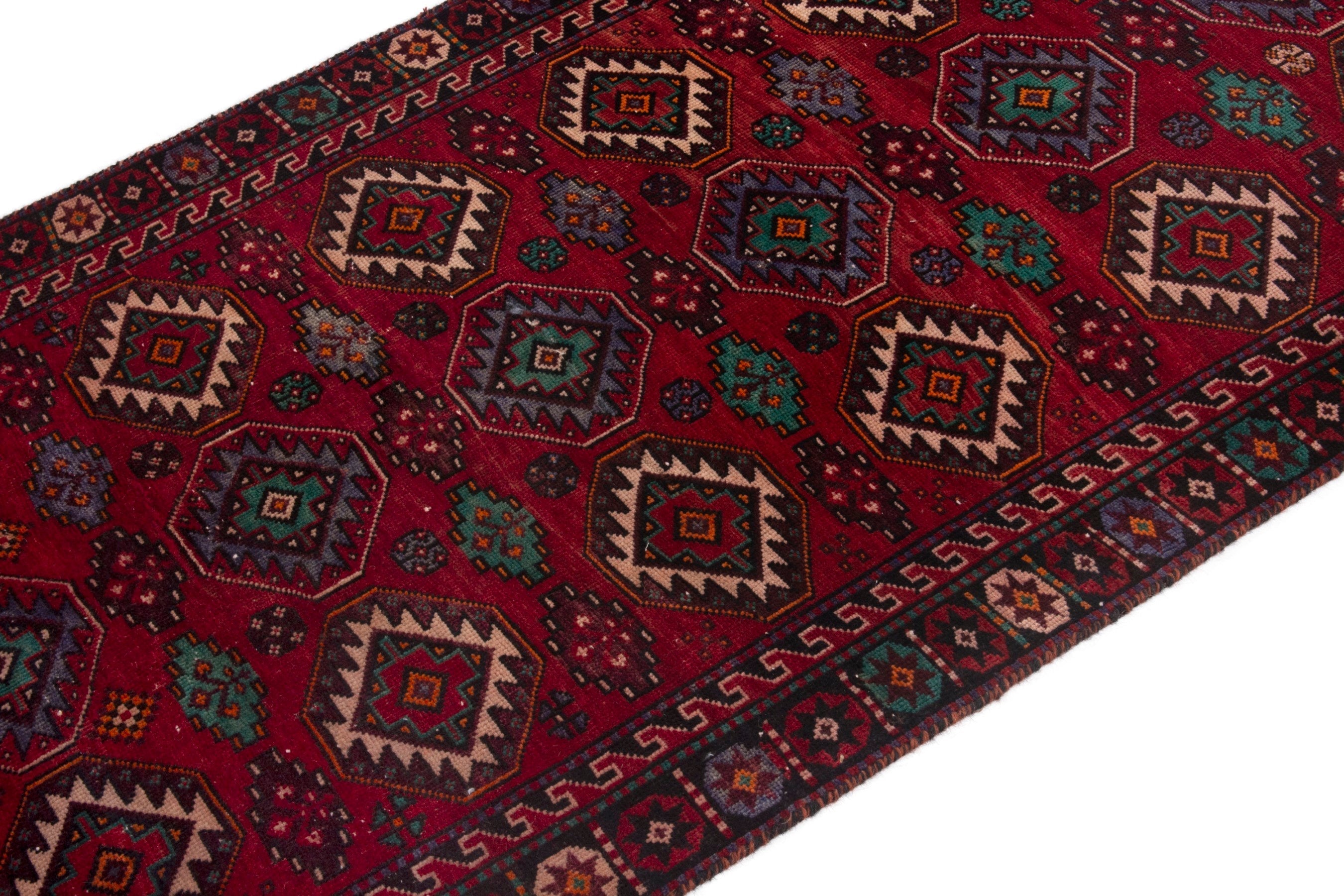 Persian Baluch area rug in deep red and burgundy, view 6 of 18