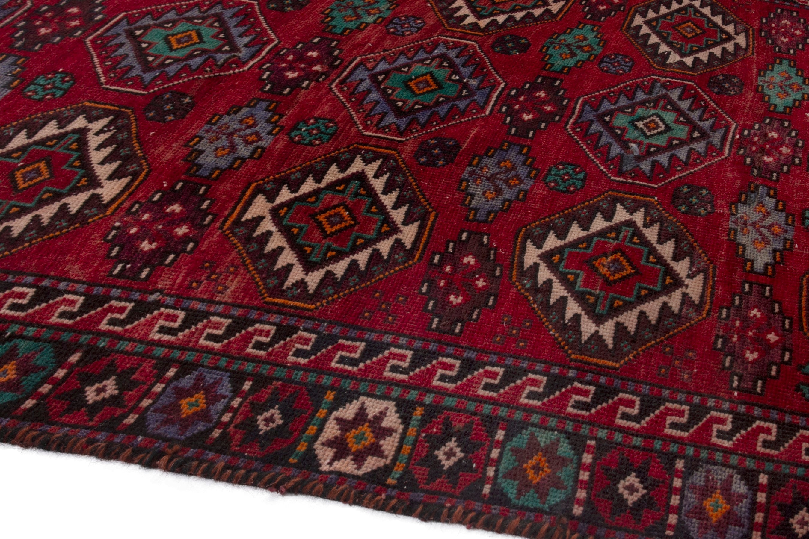 Persian Baluch area rug in deep red and burgundy, view 5 of 18
