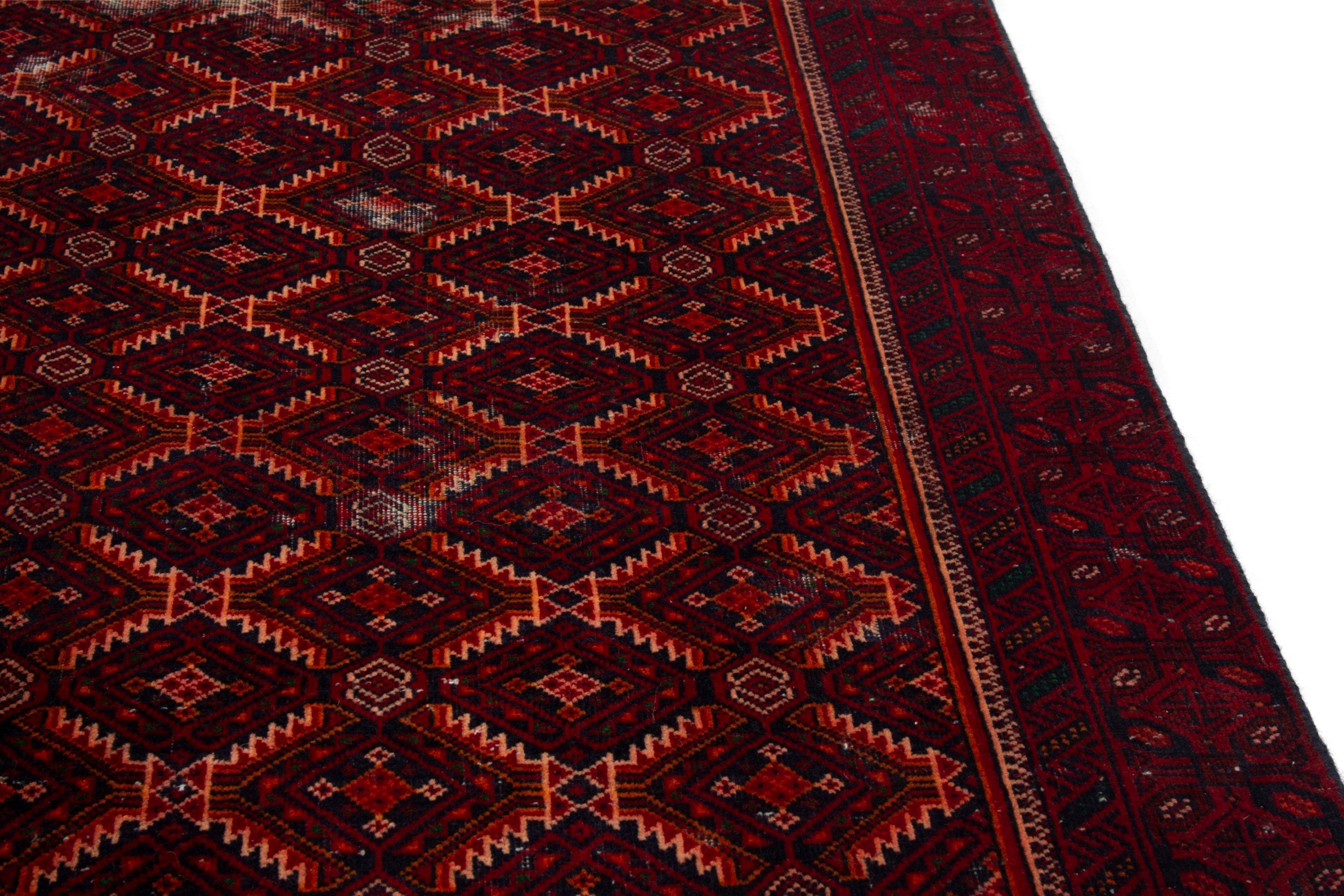 Persian Baluch accent rug in burgundy and deep red, view 9 of 17
