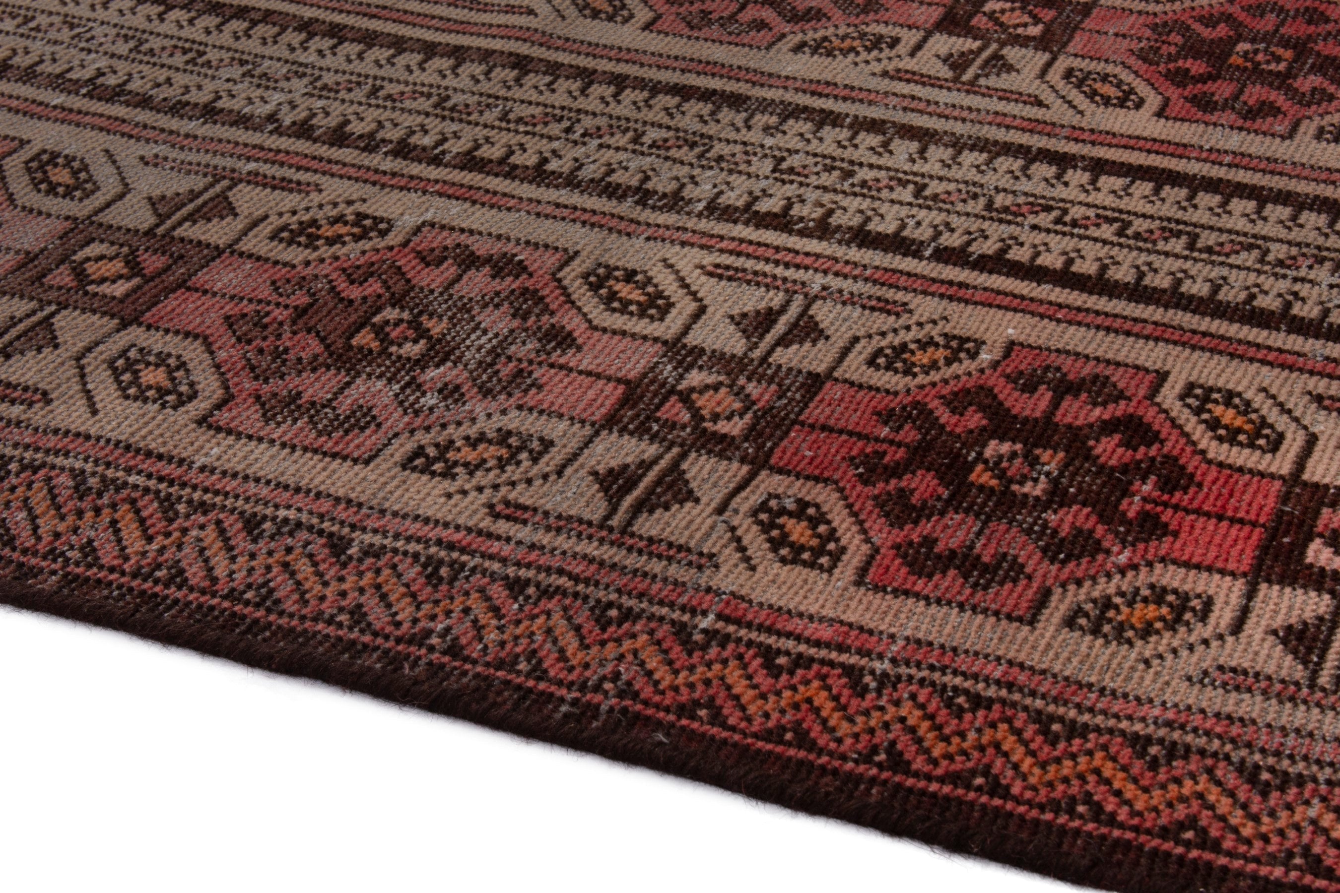 Persian Baluch accent rug in deep red and cream, view 5 of 18
