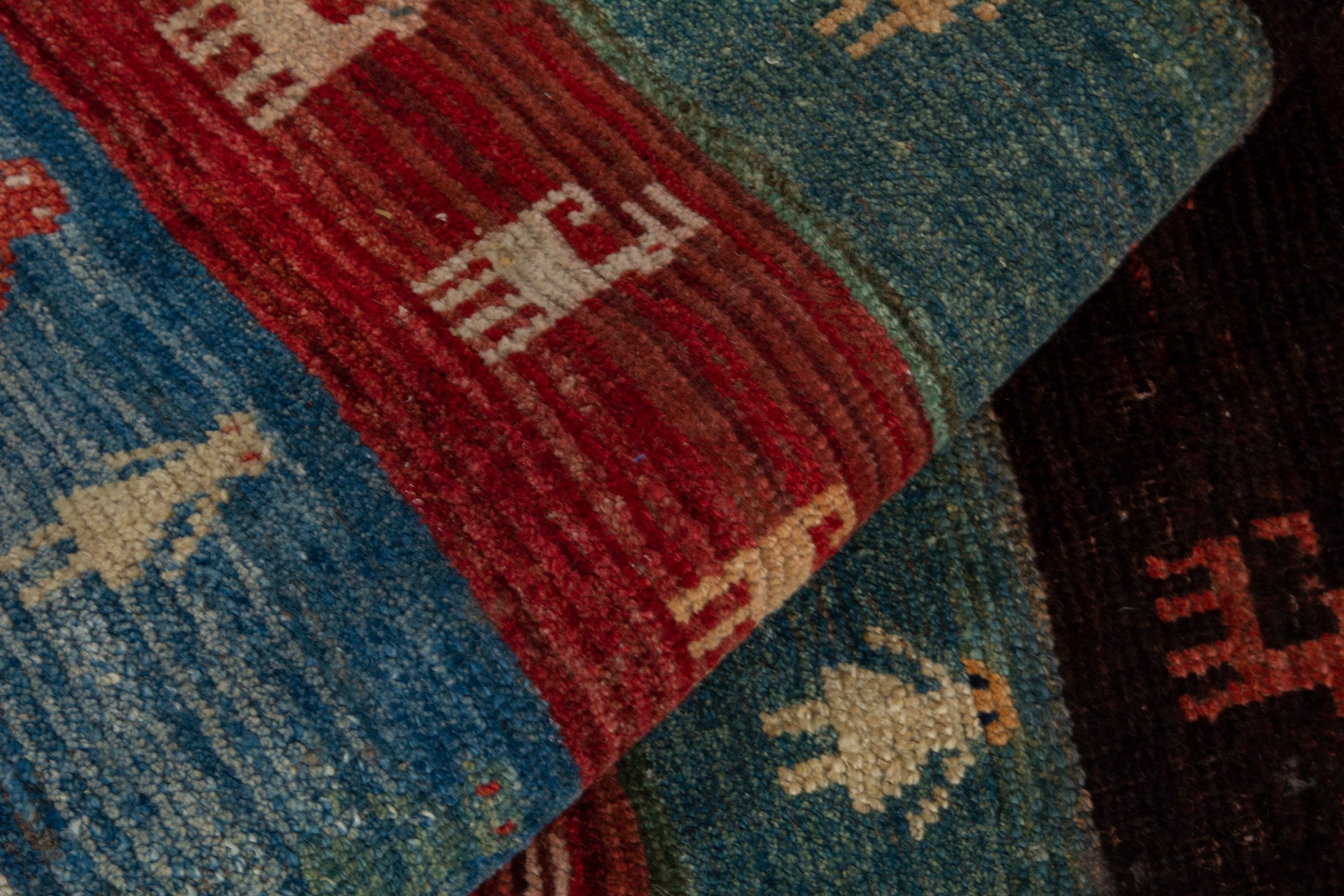 Persian Gabbeh accent rug in deep red and dark blue, view 14 of 16