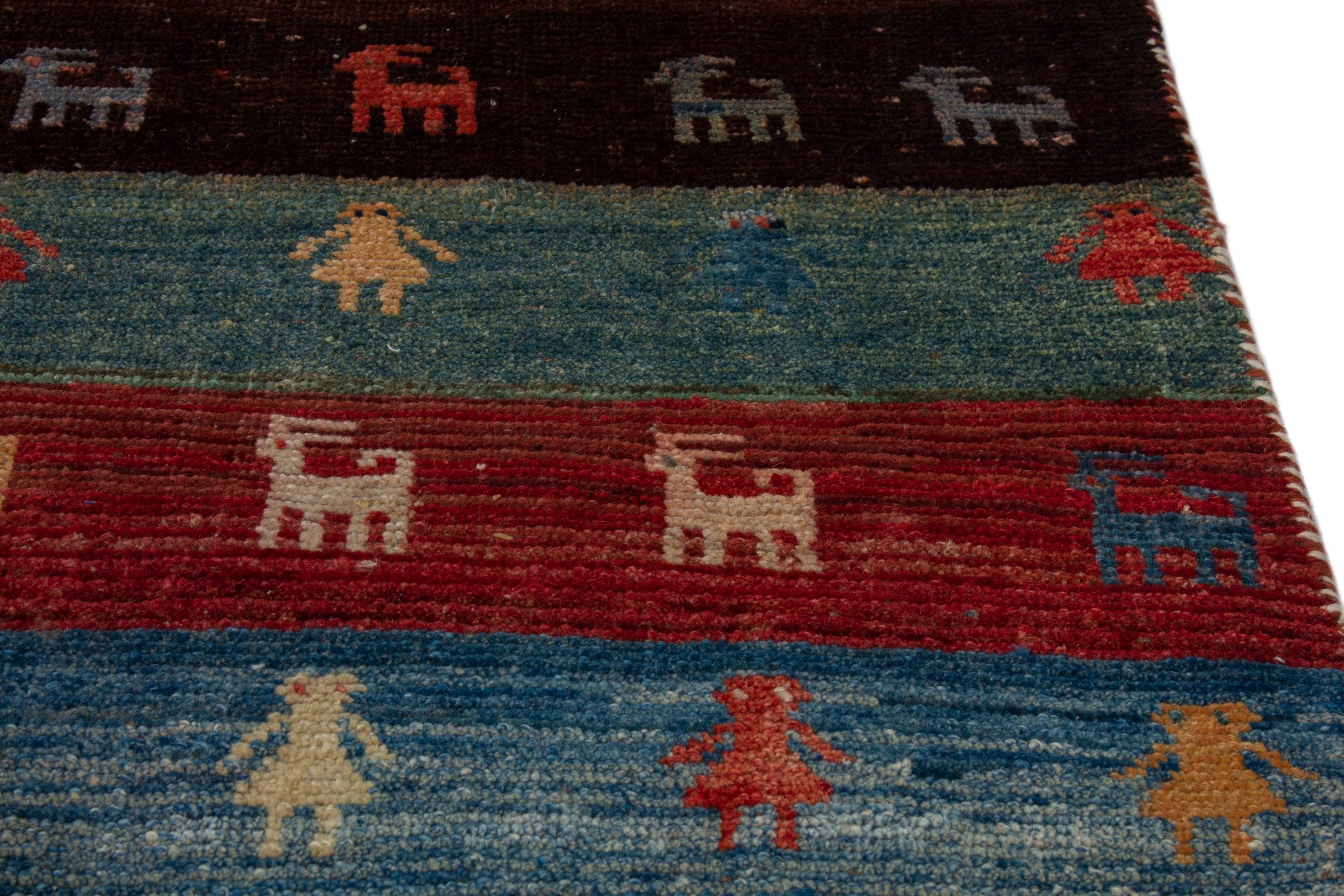 Persian Gabbeh accent rug in deep red and dark blue, view 8 of 16