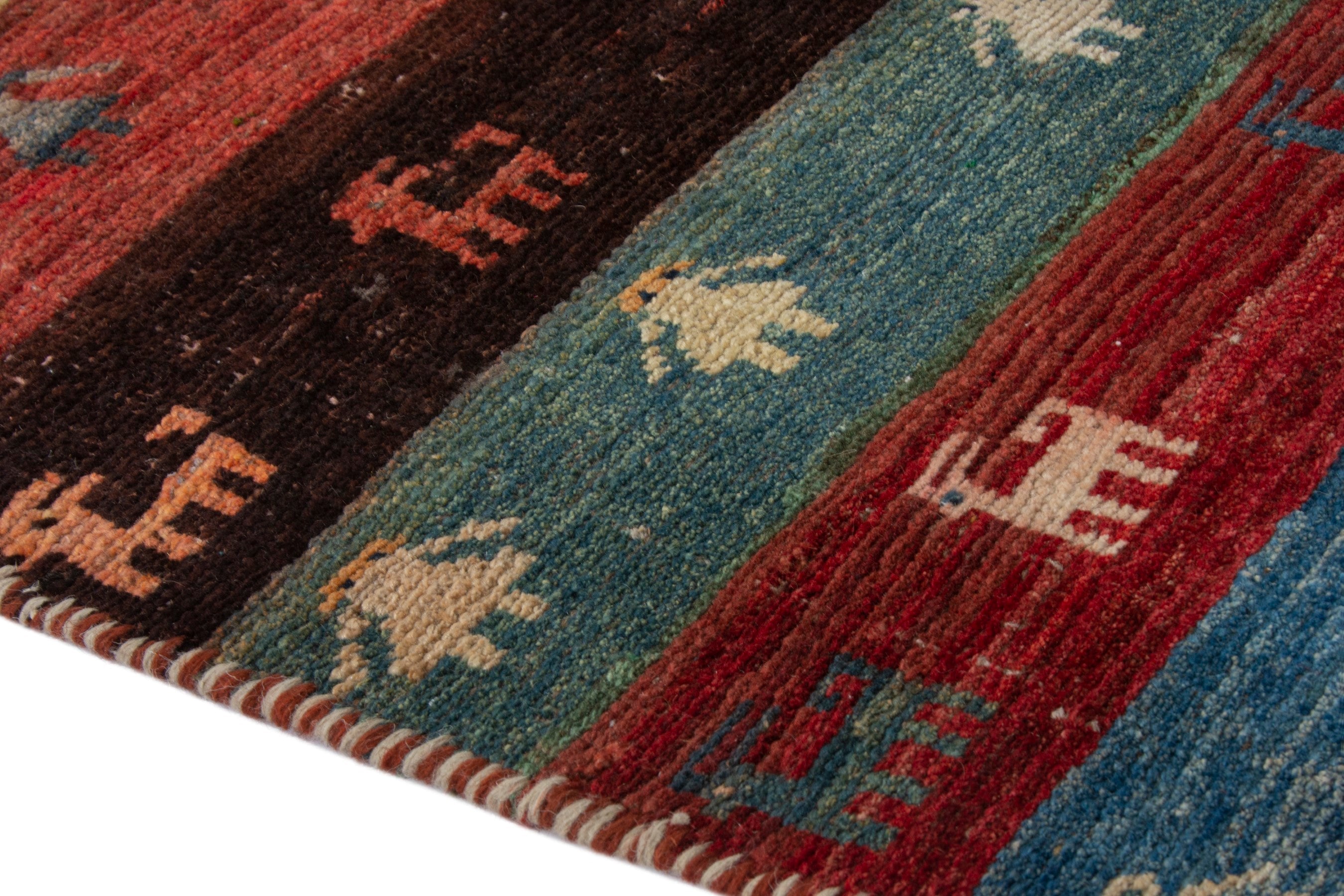 Persian Gabbeh accent rug in deep red and dark blue, view 5 of 16