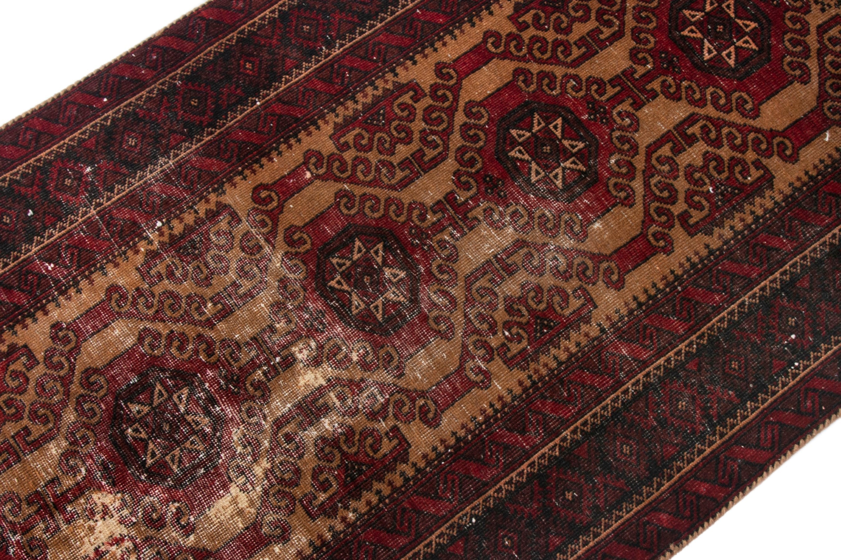Persian Baluch accent rug in burgundy and deep red, view 6 of 17