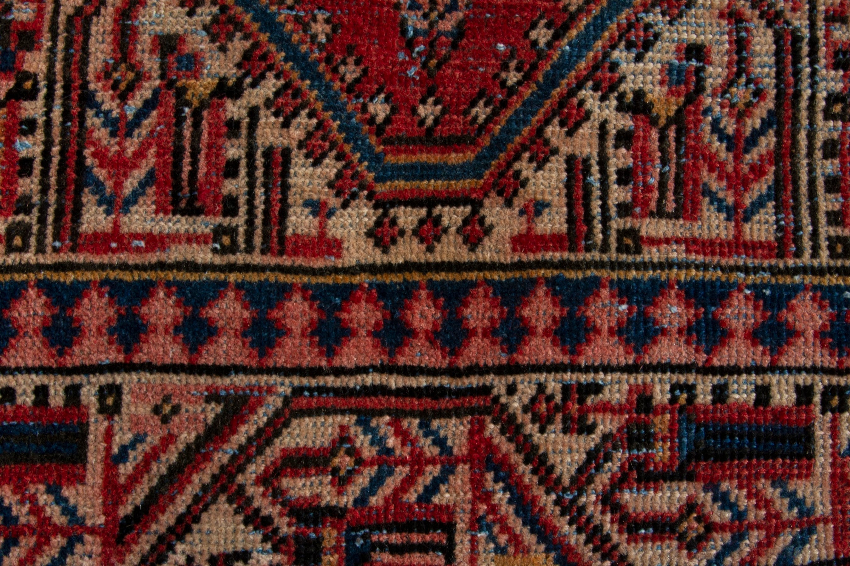 Persian Arak area rug in deep red and rust, view 10 of 18