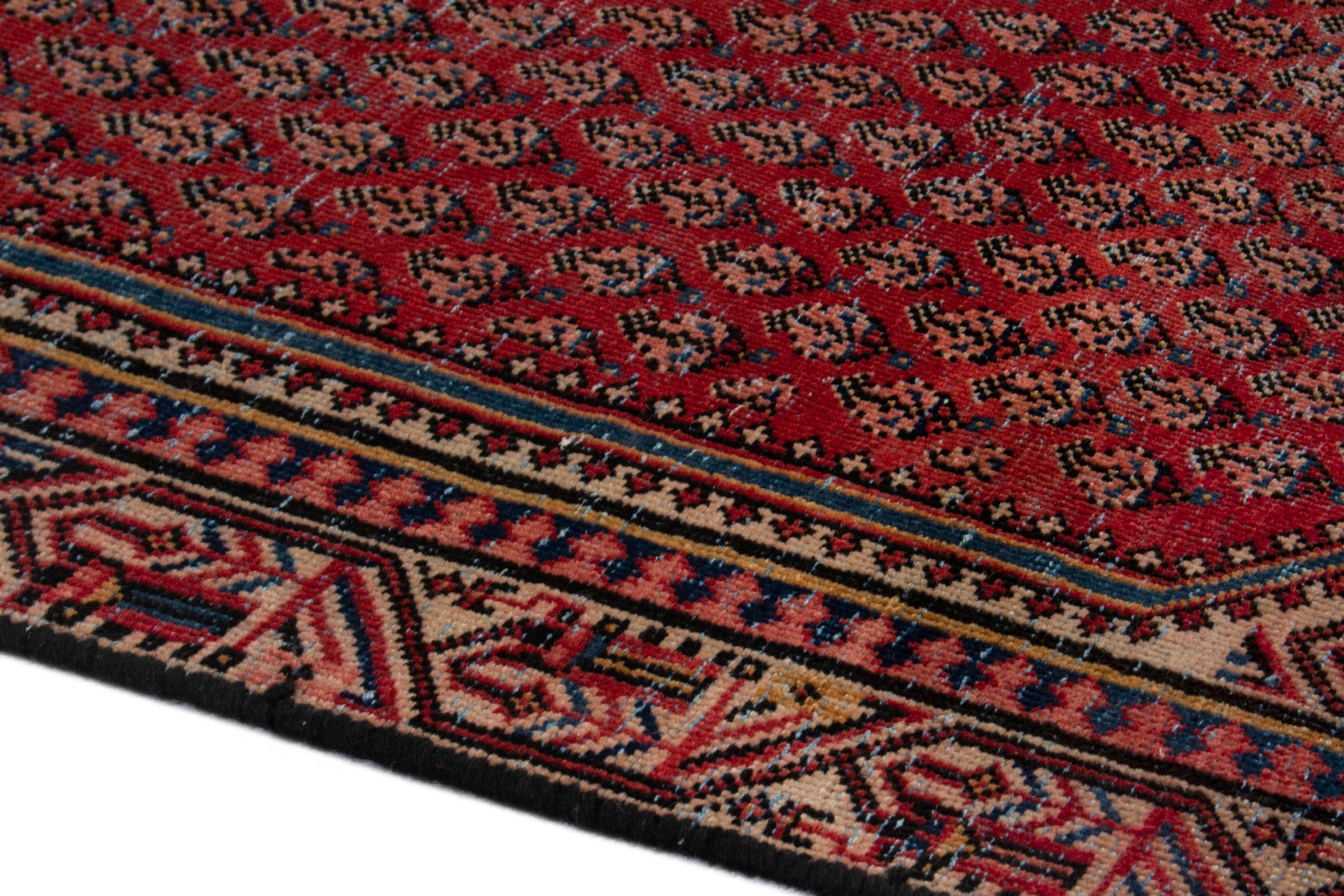 Persian Arak area rug in deep red and rust, view 5 of 18