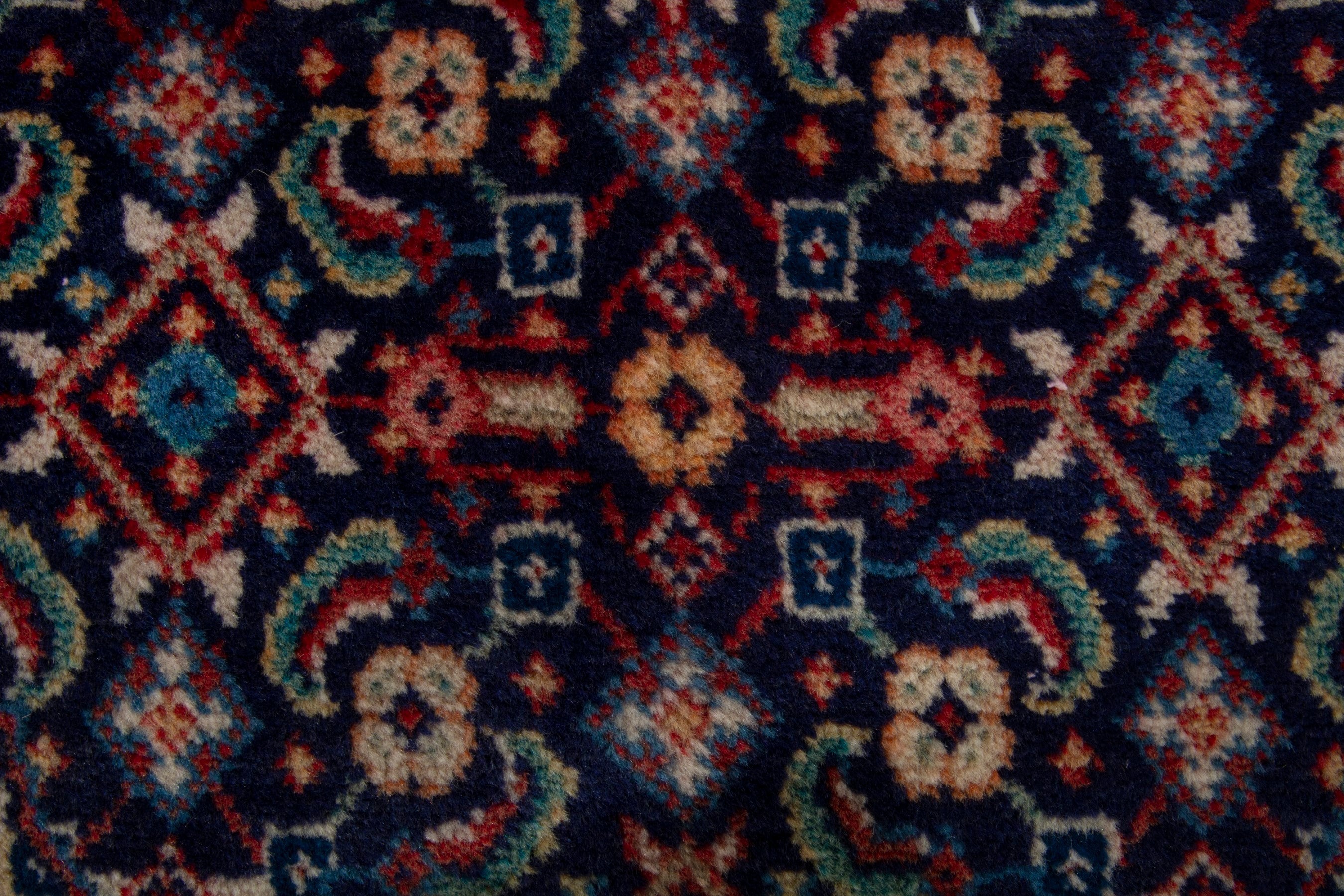 Persian Mahal area rug in navy and deep red, view 12 of 17