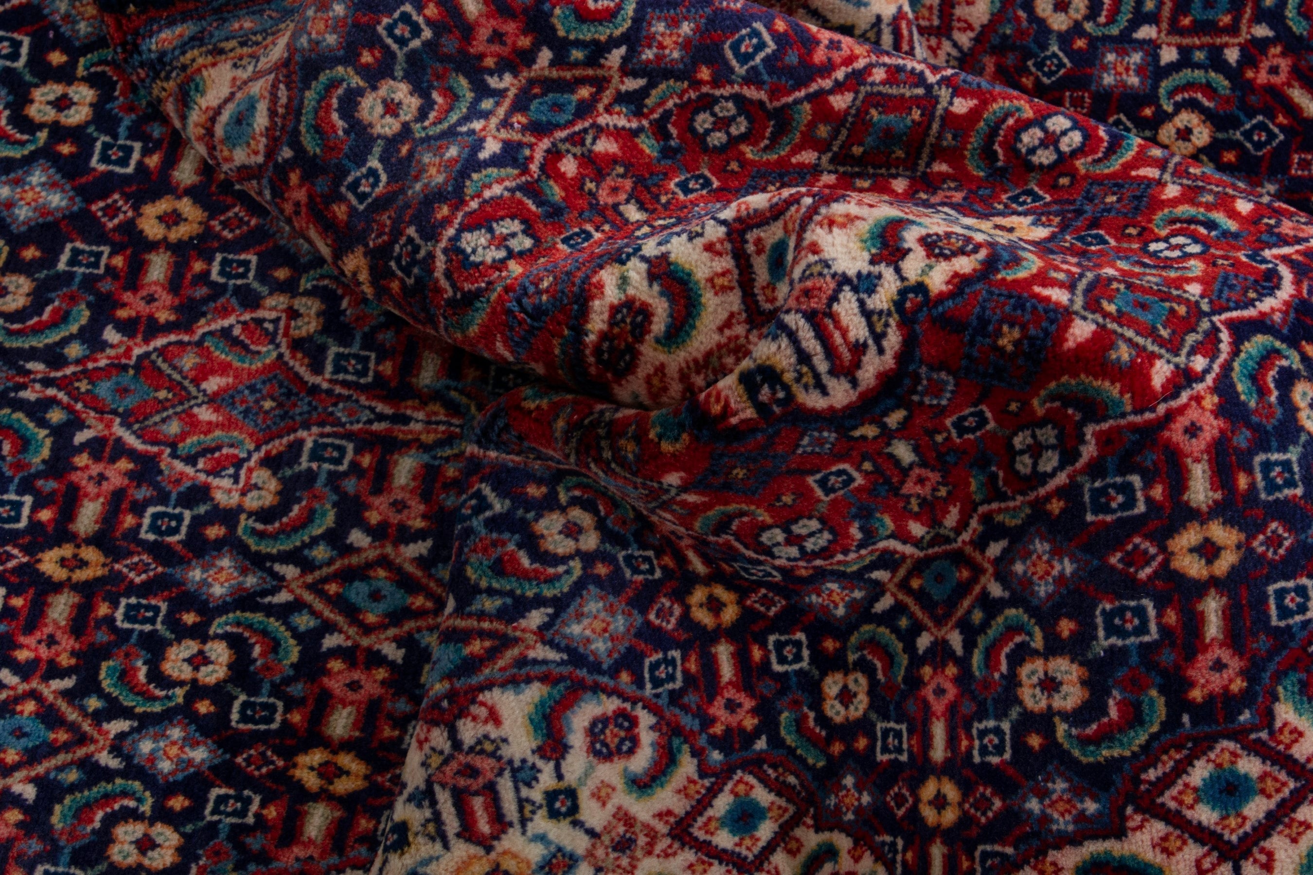 Persian Mahal area rug in navy and deep red, view 14 of 17