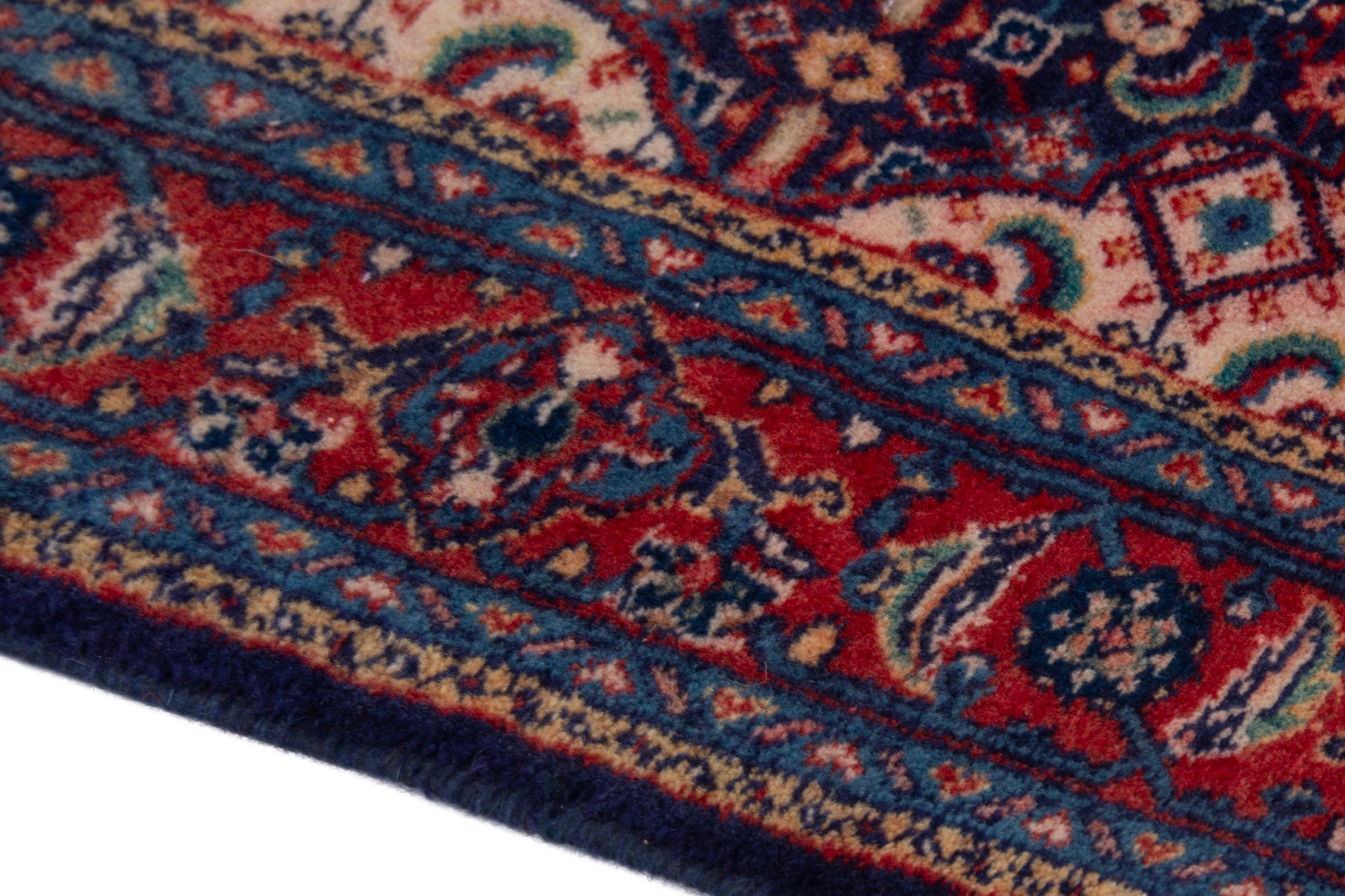 Persian Mahal area rug in navy and deep red, view 5 of 17