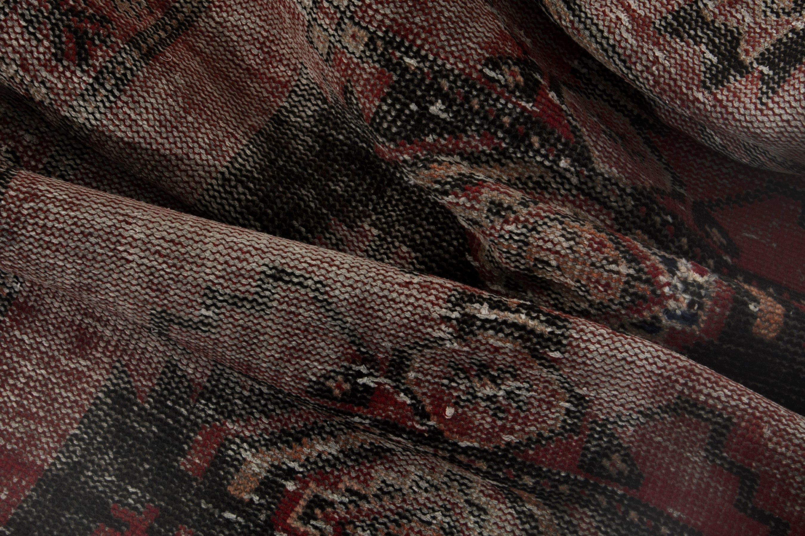 Persian Ferdos accent rug in faded red and deep red, view 14 of 16