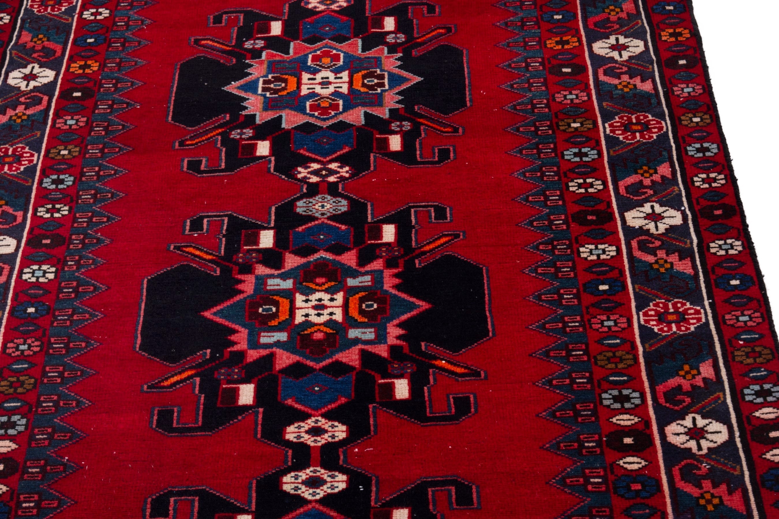 Persian Zanjan runner rug in deep red and burgundy, view 8 of 17