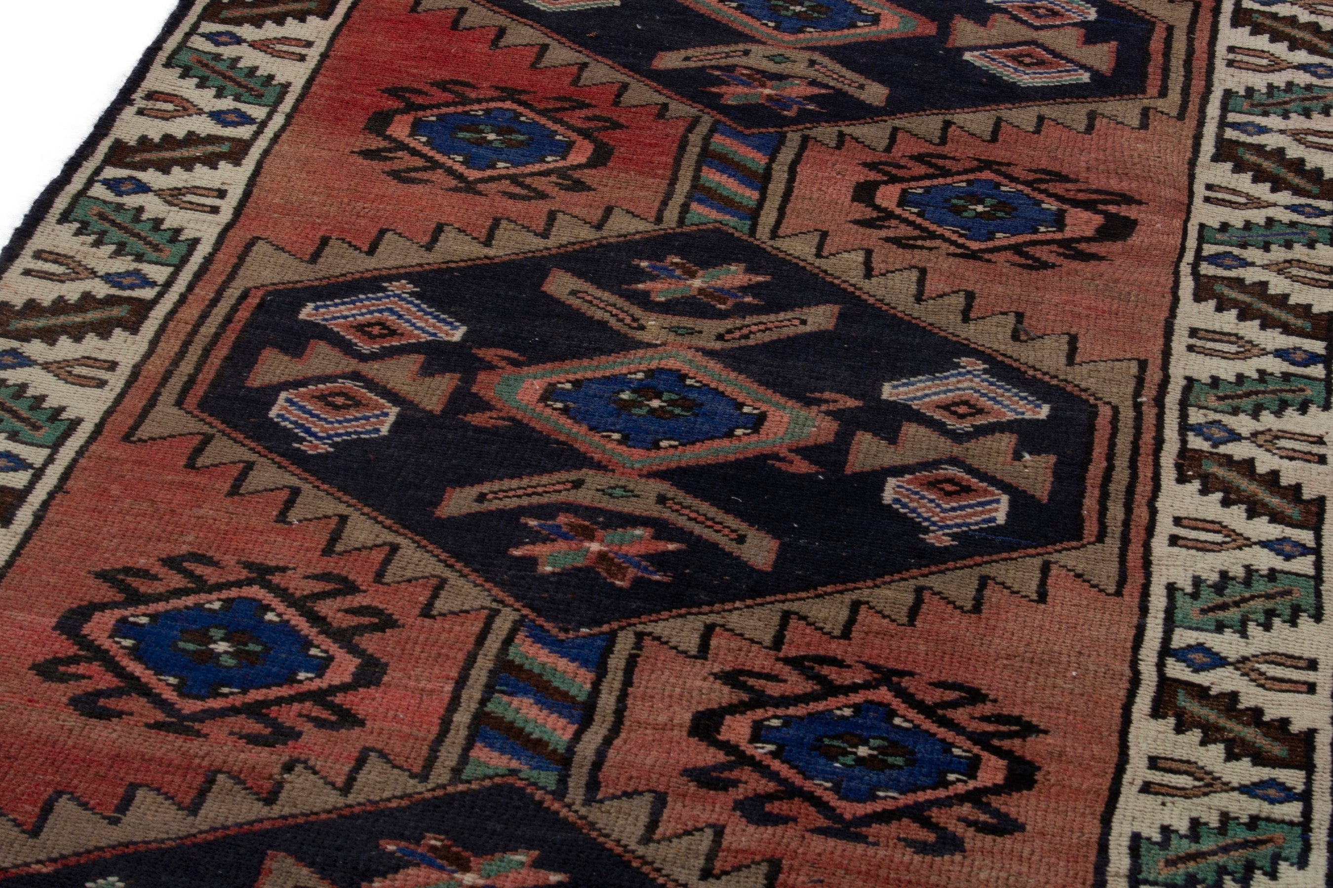 Persian Lori runner rug in rust and navy, view 7 of 18