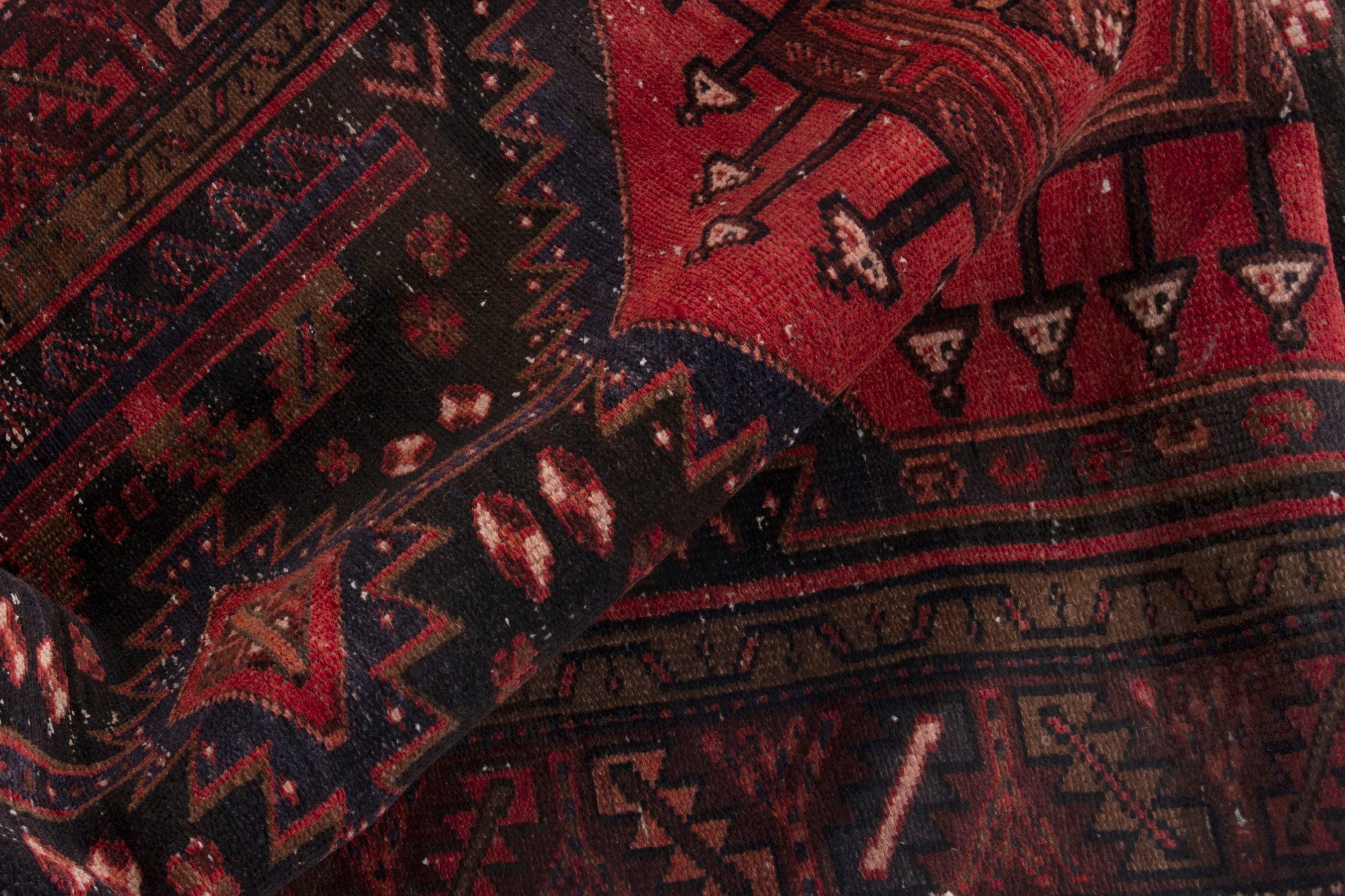 Persian Zanjan runner rug in deep indigo and deep red, view 16 of 18