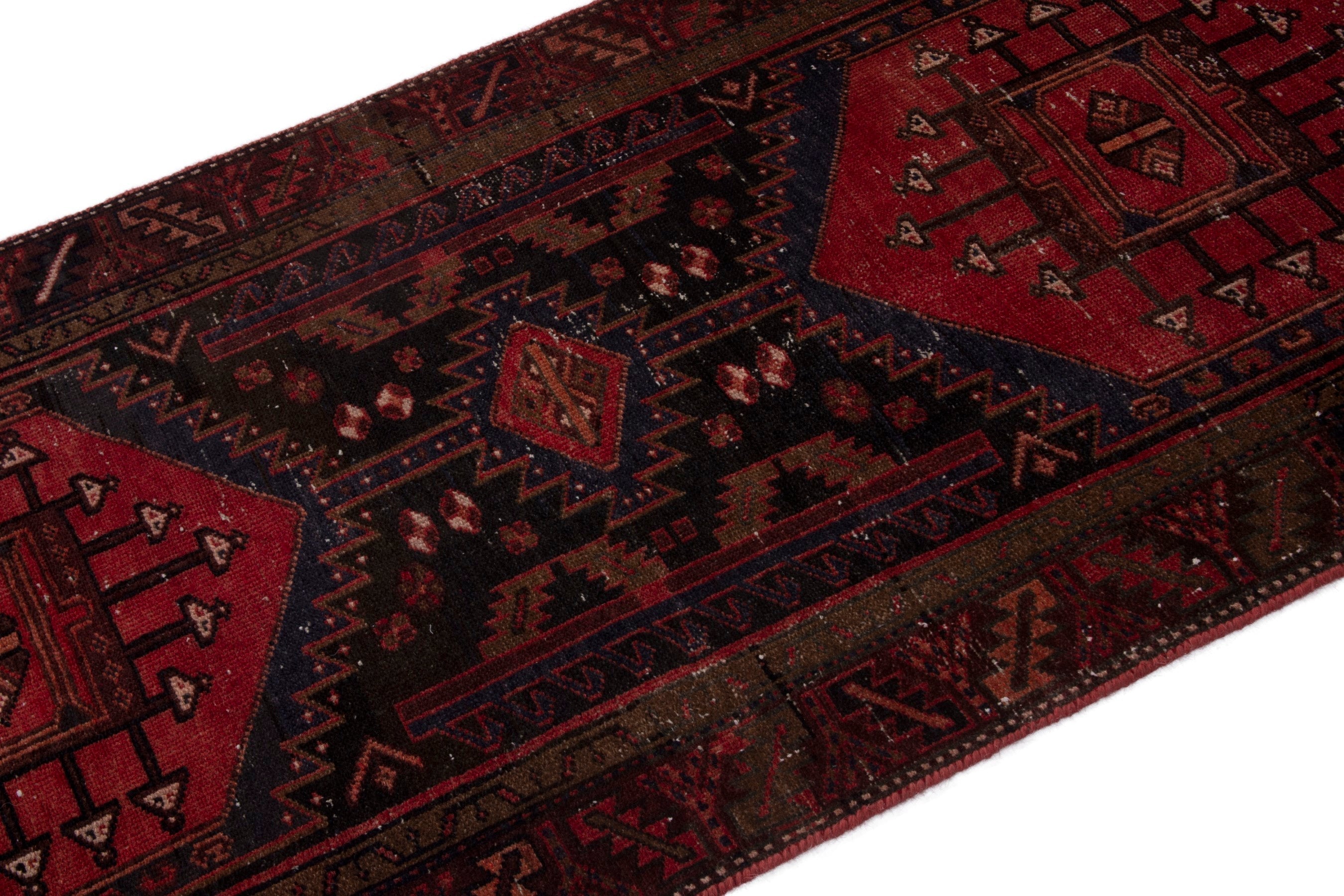Persian Zanjan runner rug in deep indigo and deep red, view 6 of 18
