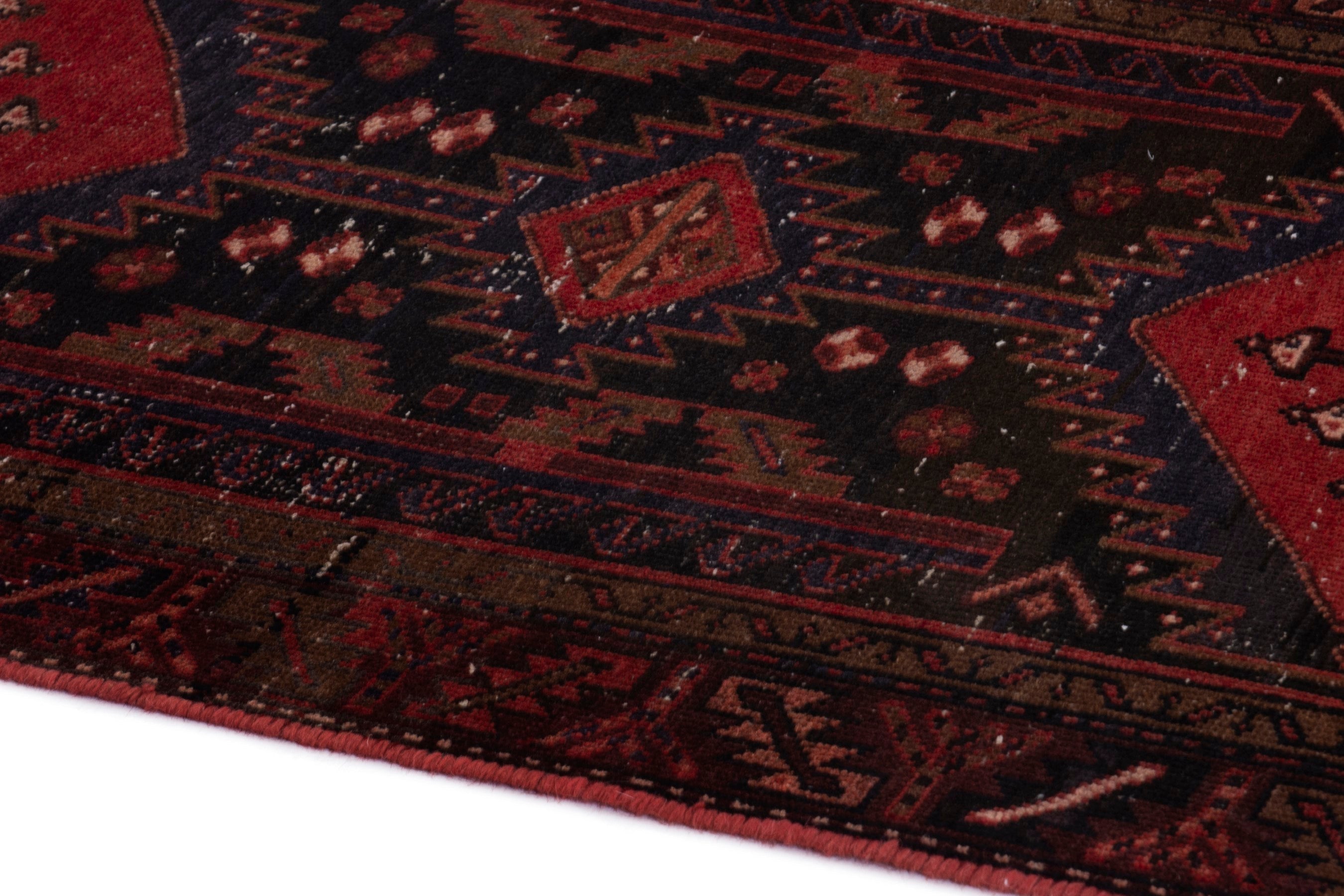 Persian Zanjan runner rug in deep indigo and deep red, view 5 of 18