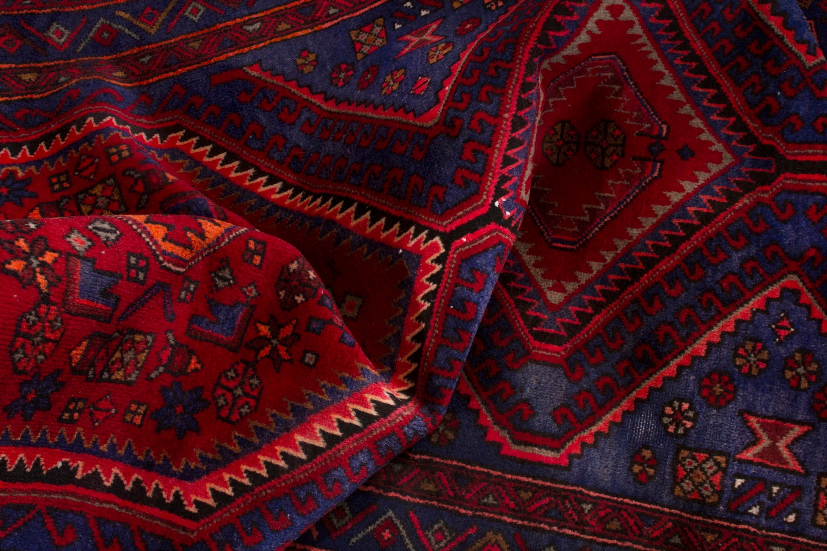 Persian Zanjan runner rug in deep red and dark blue, view 16 of 19