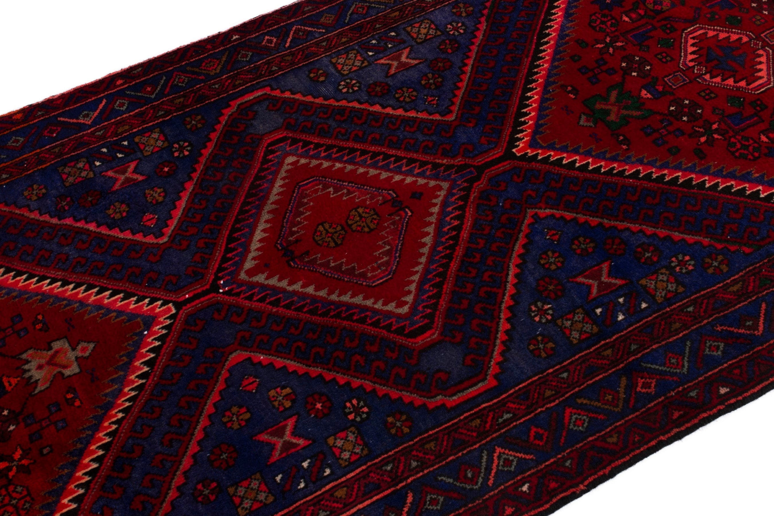 Persian Zanjan runner rug in deep red and dark blue, view 6 of 19