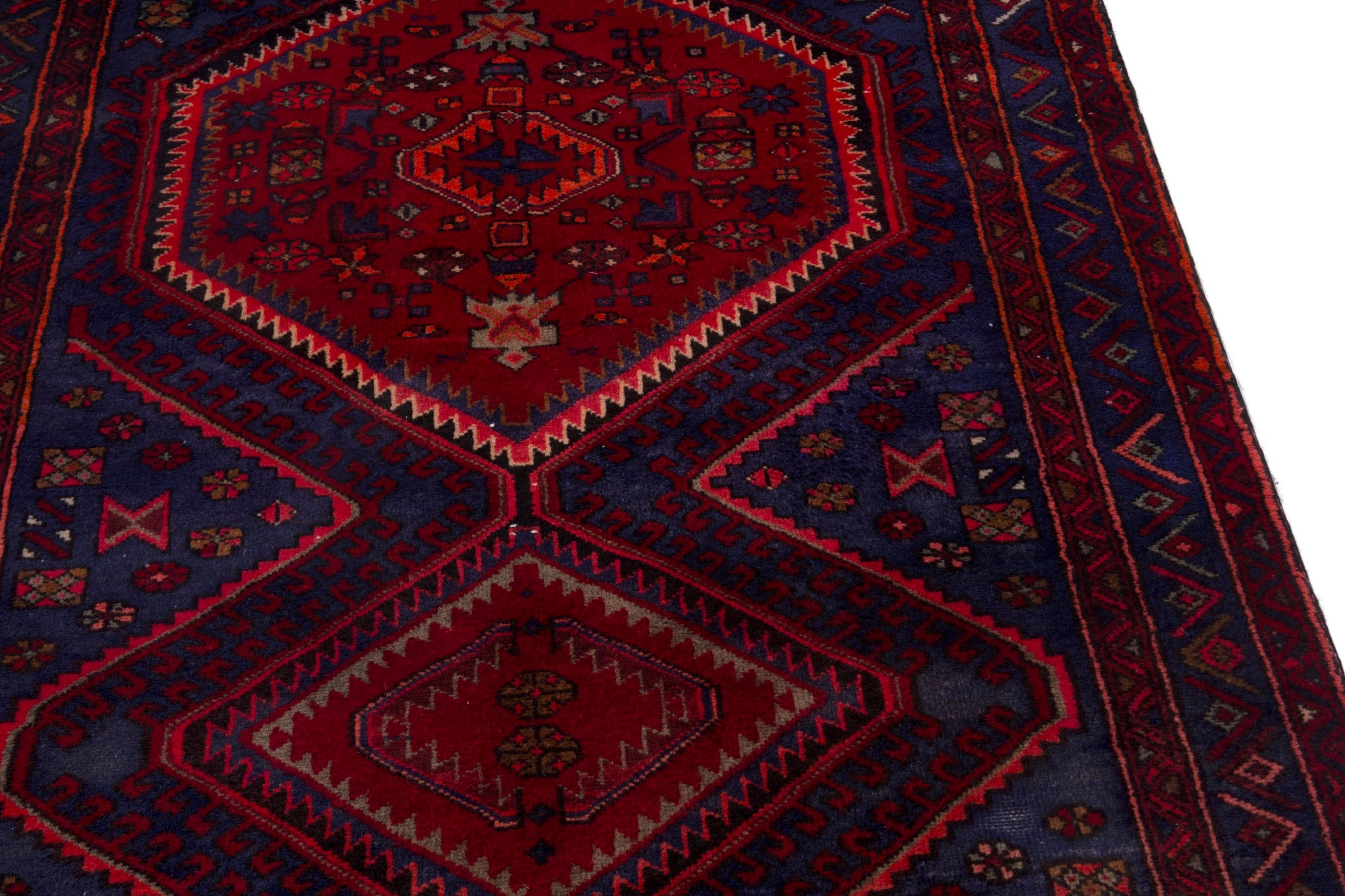 Persian Zanjan runner rug in deep red and dark blue, view 10 of 19